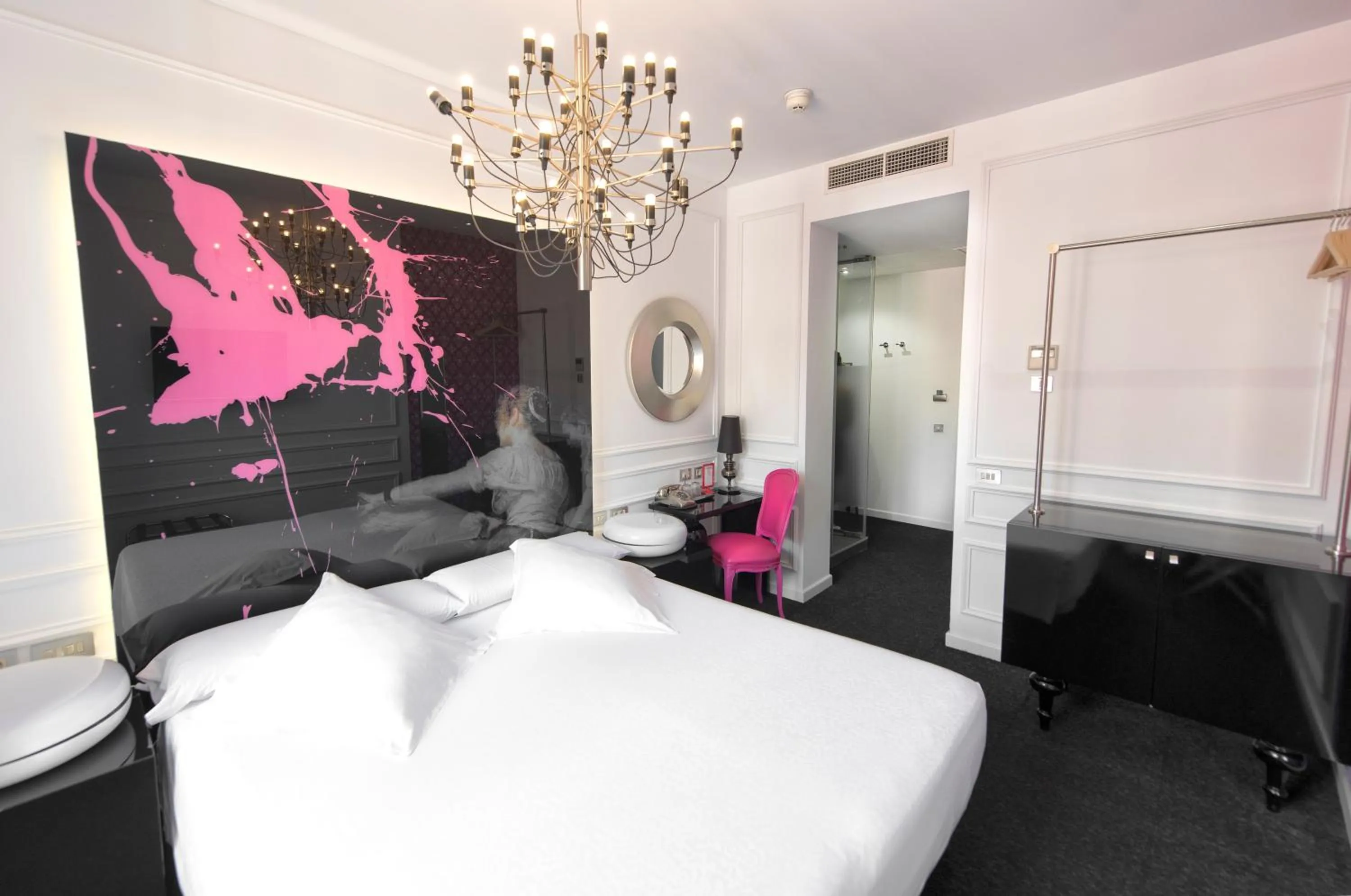 Bed in Posada del Dragón Boutique Hotel