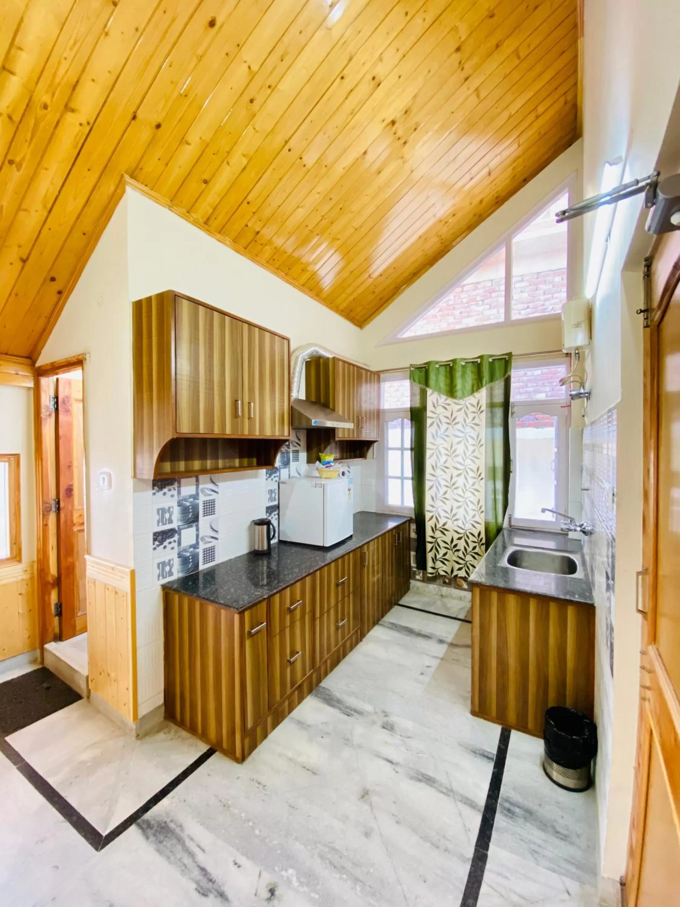 Kitchen or kitchenette in Sai Cottage Shimla