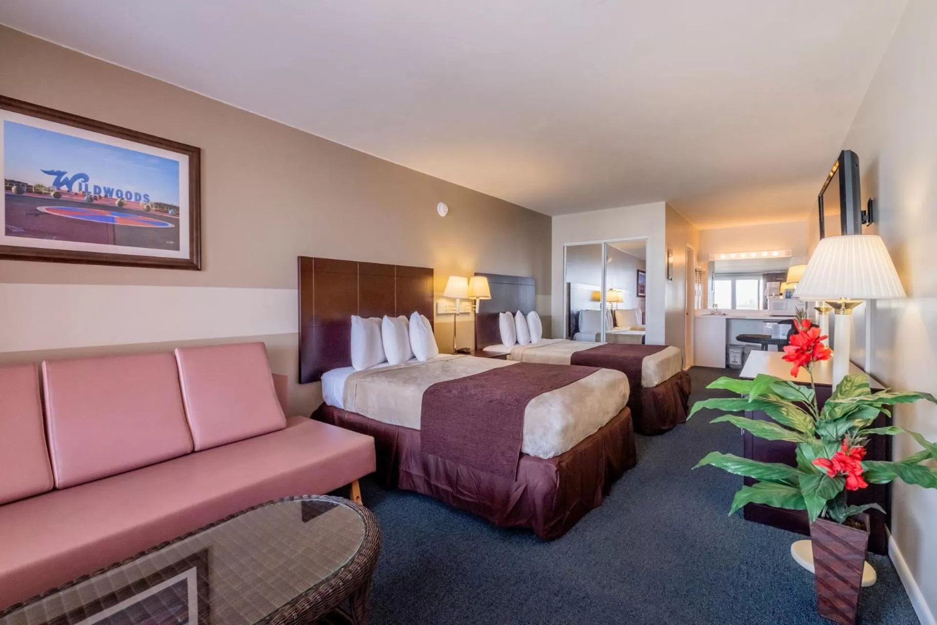 Bed in Heart of Wildwood Boardwalk Motel