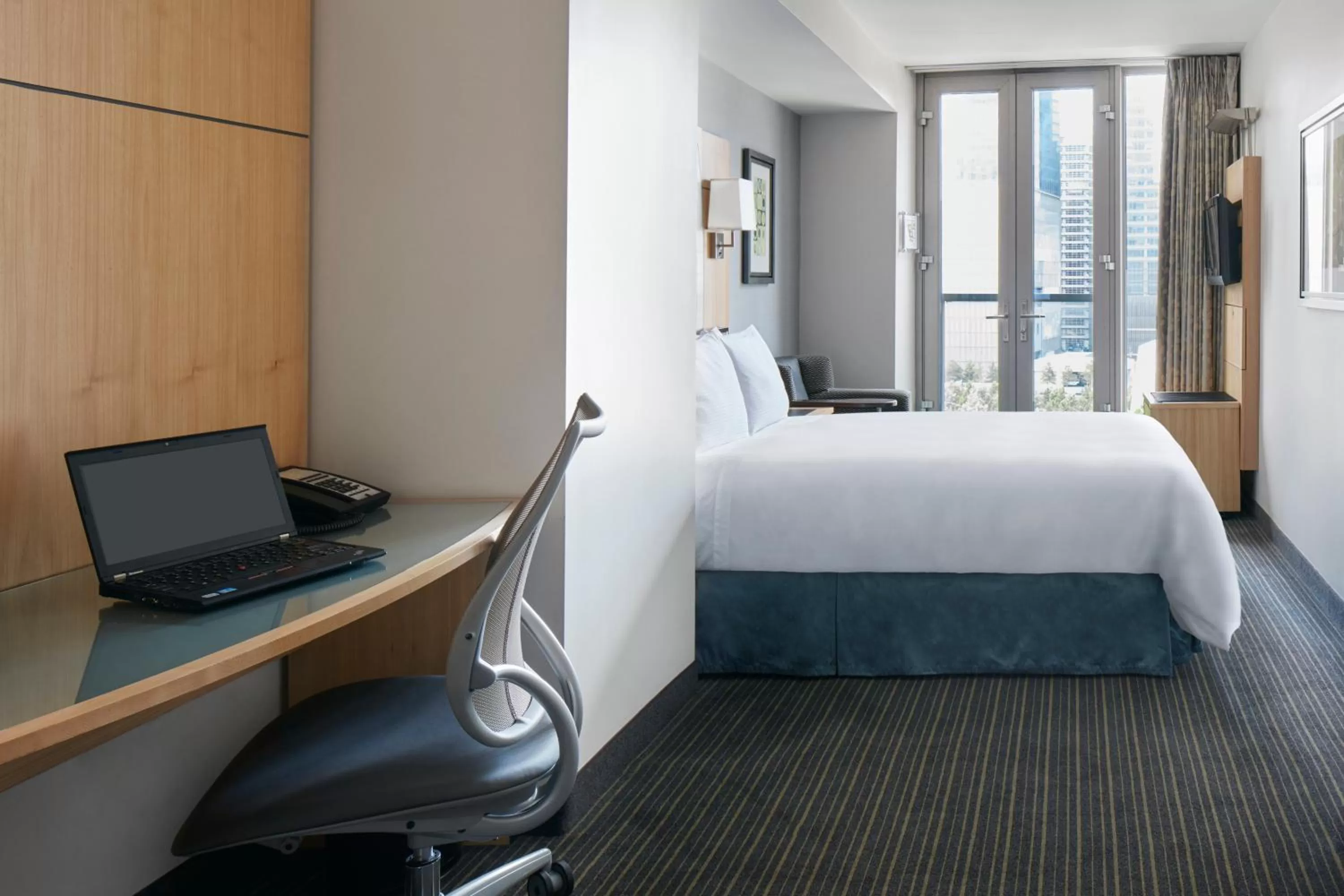 Bed in World Center Hotel