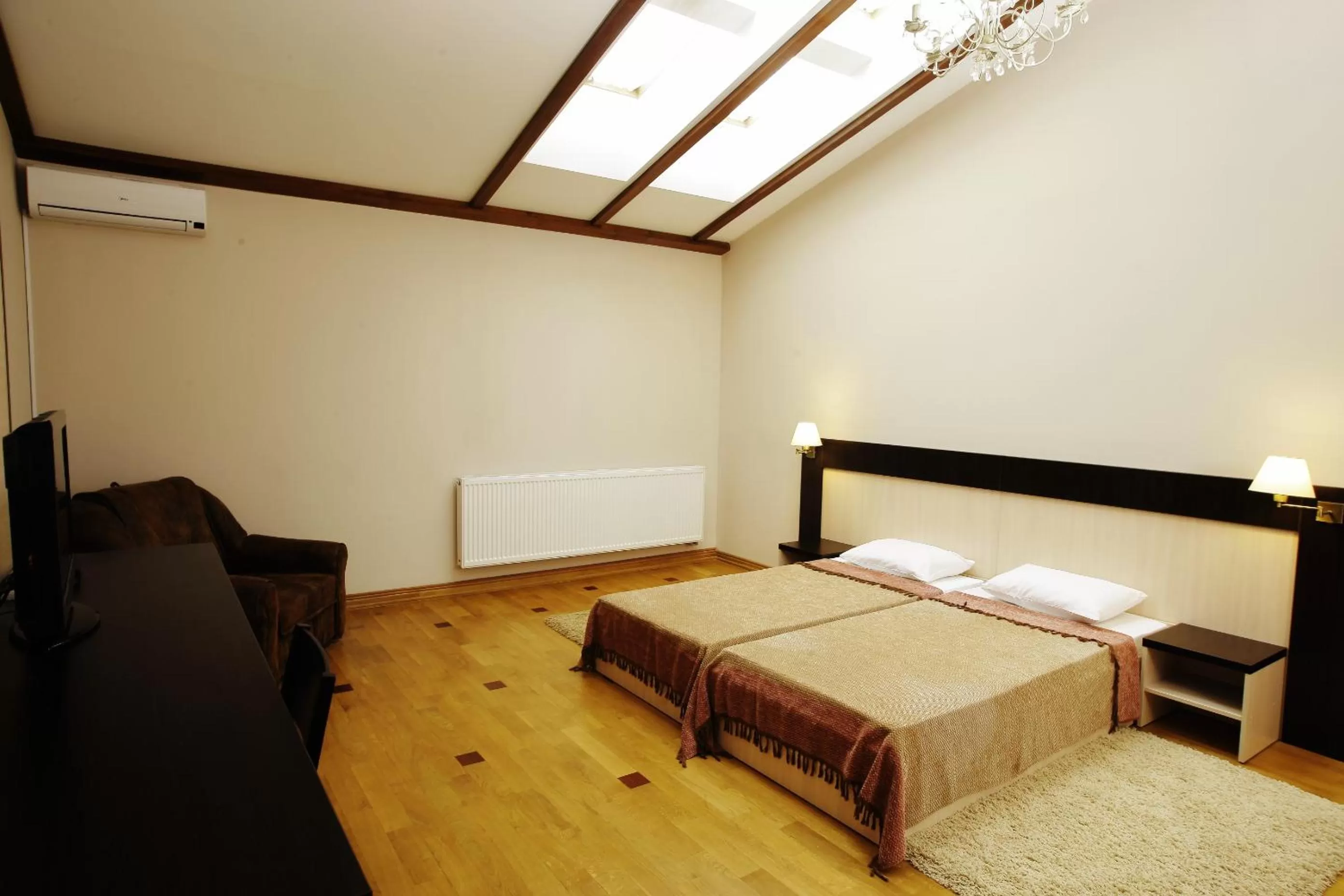 Bed in Mini-Hotel Under The Roof