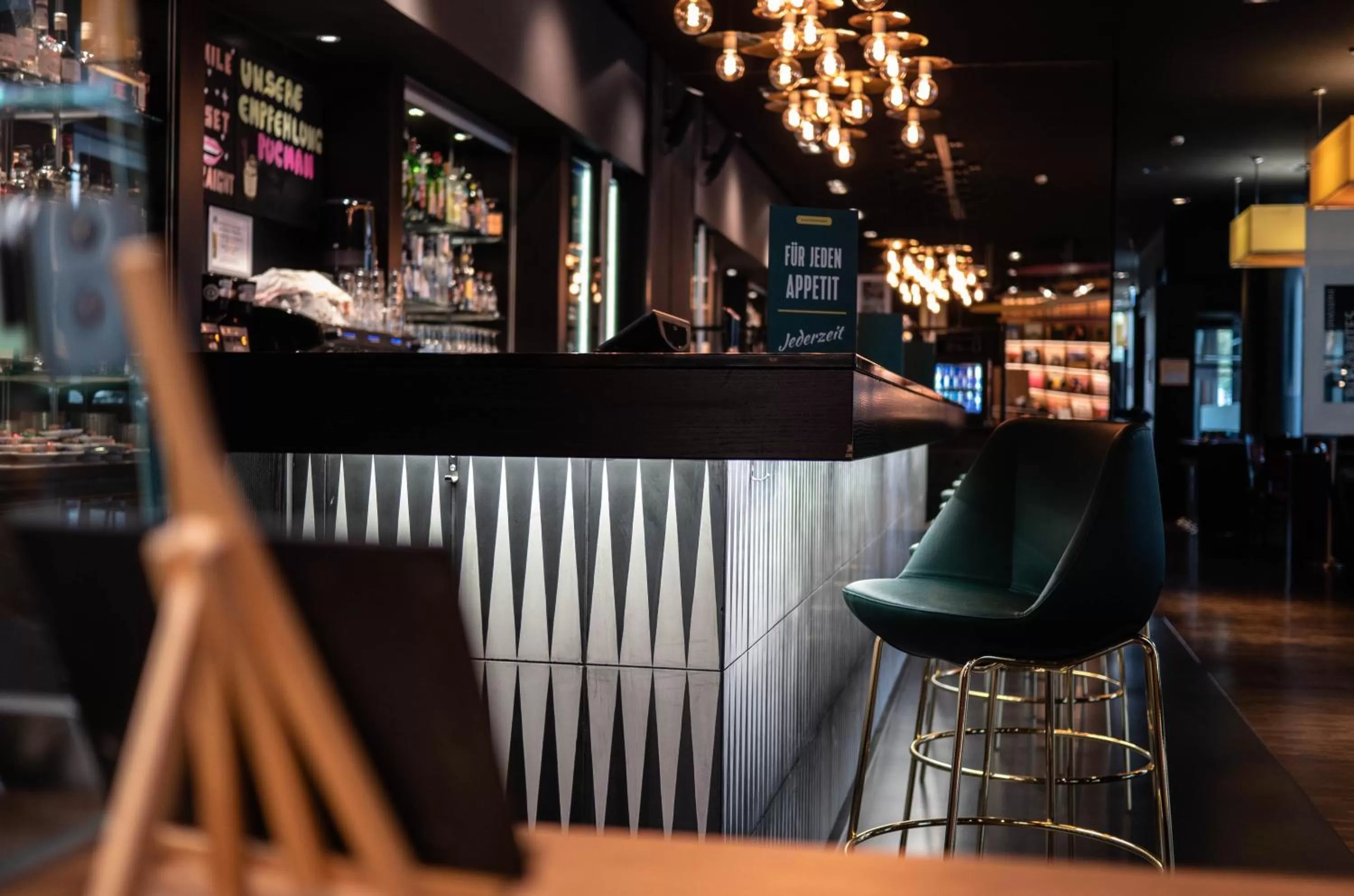 Lounge or bar in Holiday Inn Zürich Messe by IHG