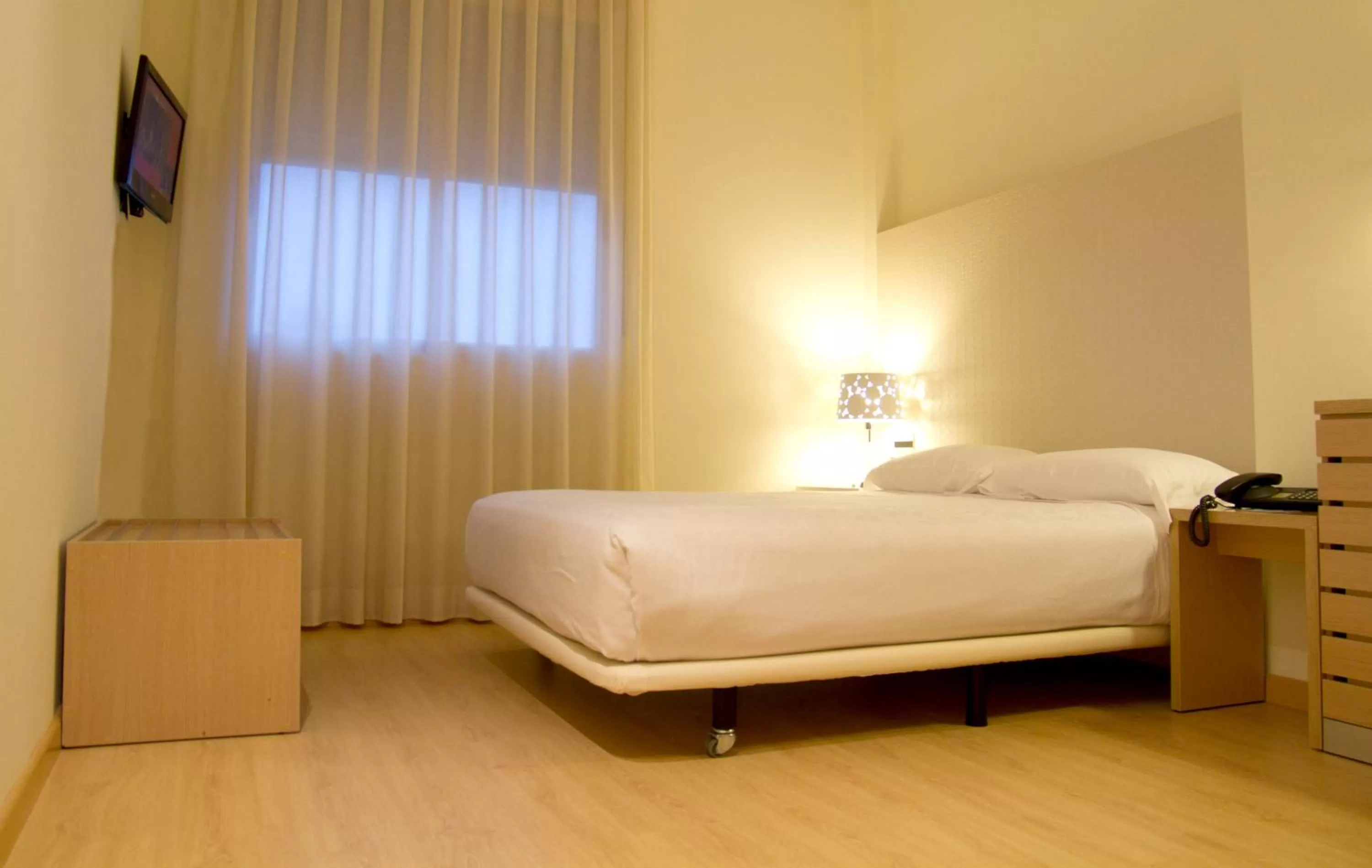 Bed in Checkin Valencia Ciscar