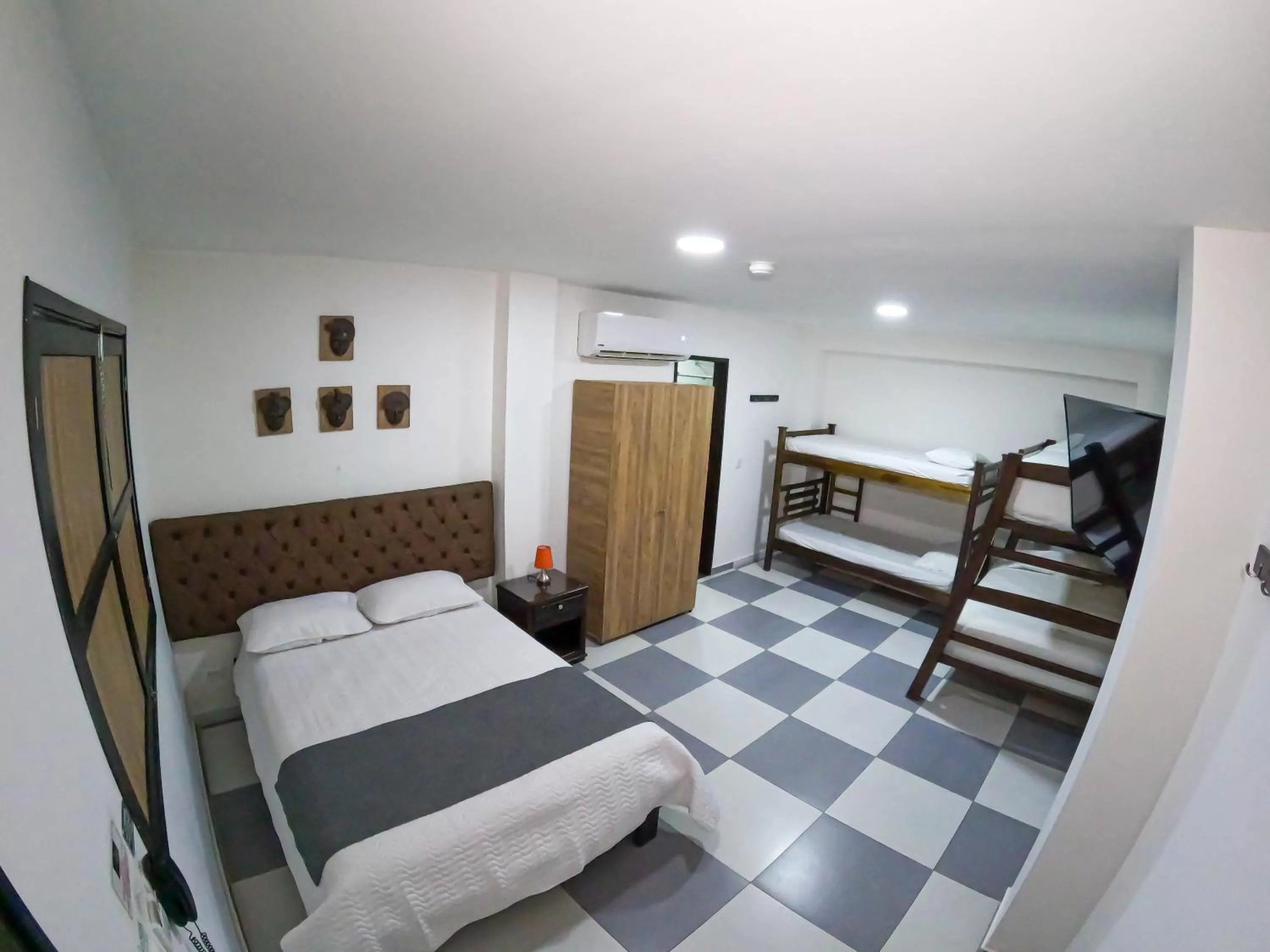 Property building, Bed in Hotel El Olimpo