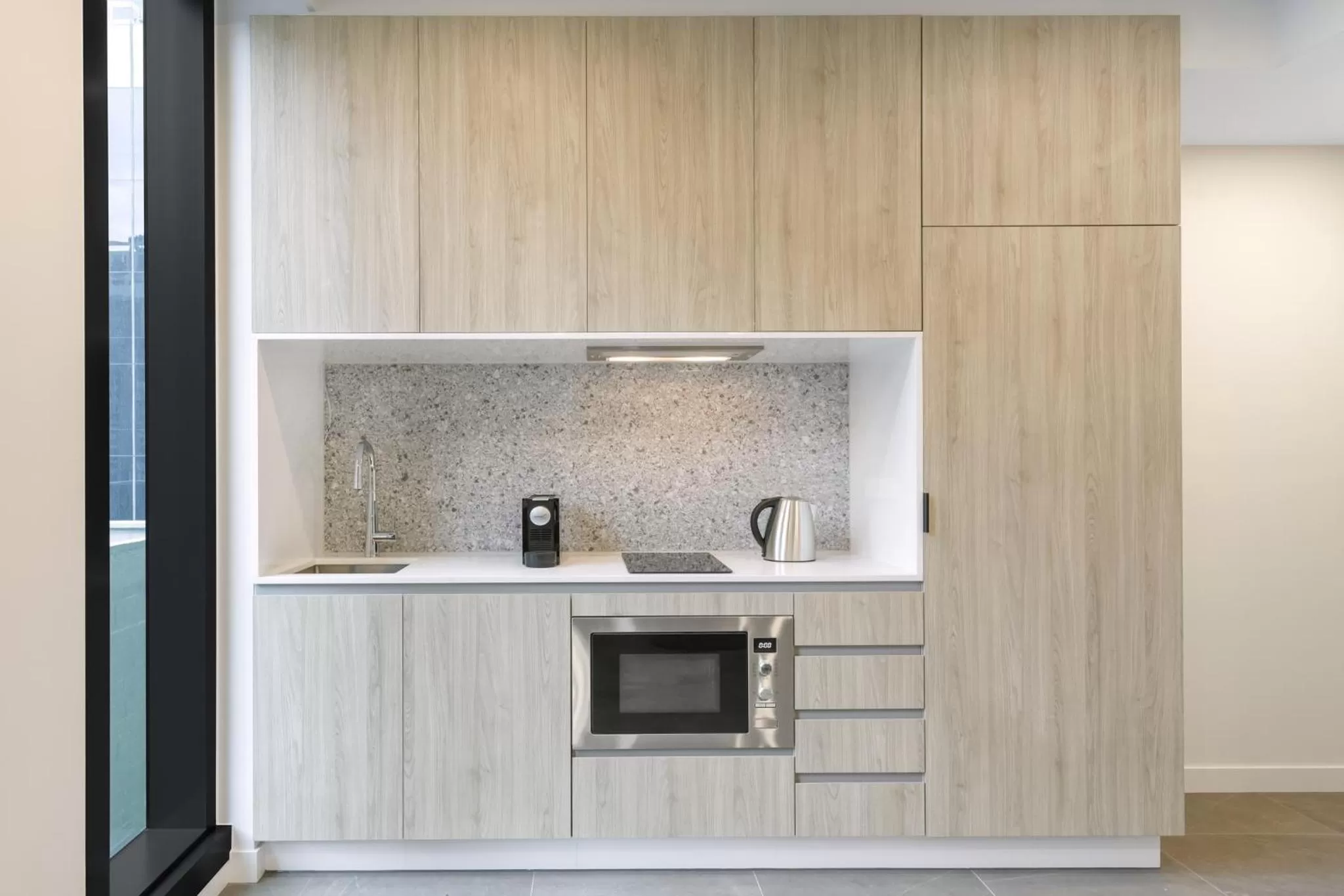Kitchen or kitchenette in Meriton Suites Melbourne