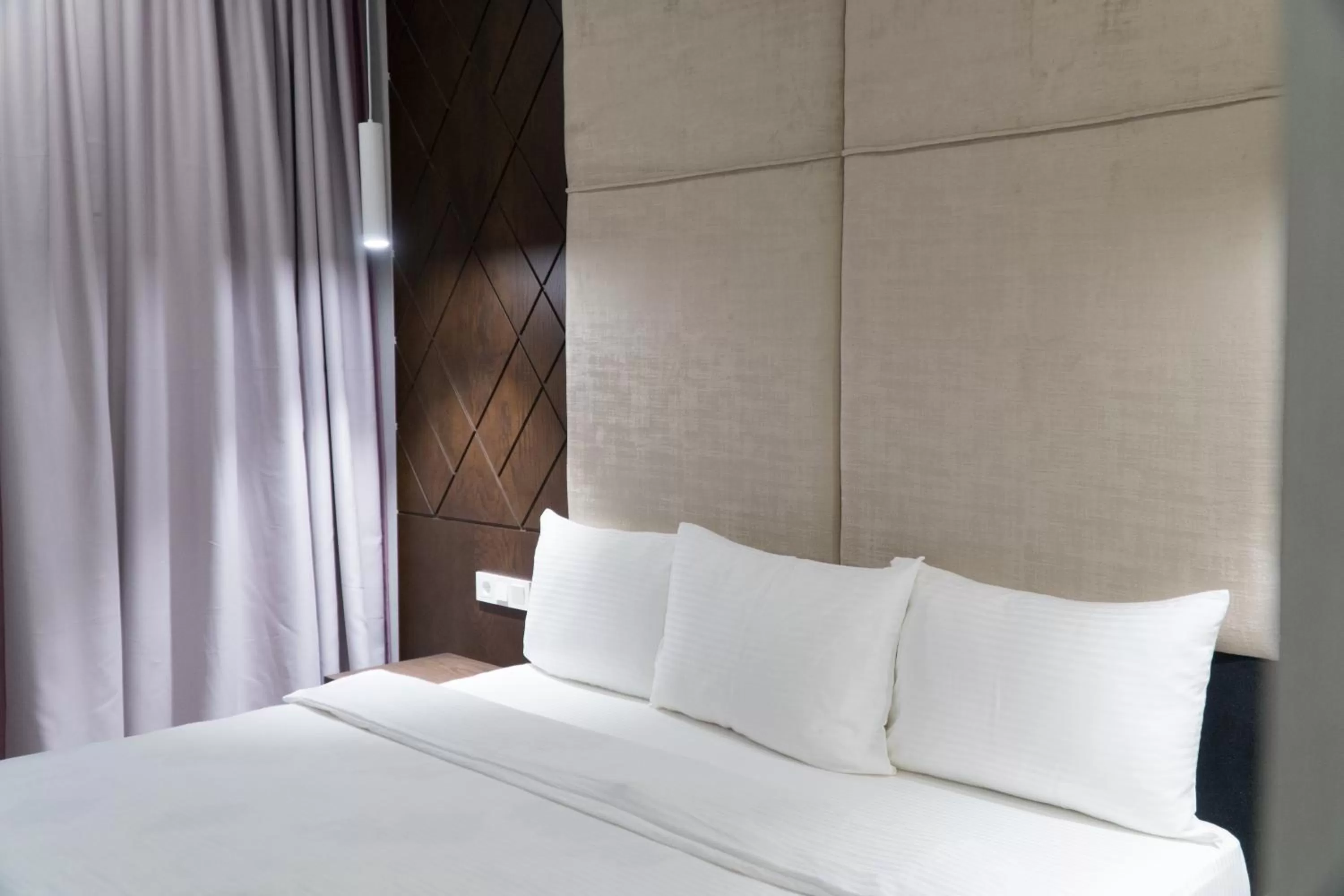 Bed in East Palace Hotel