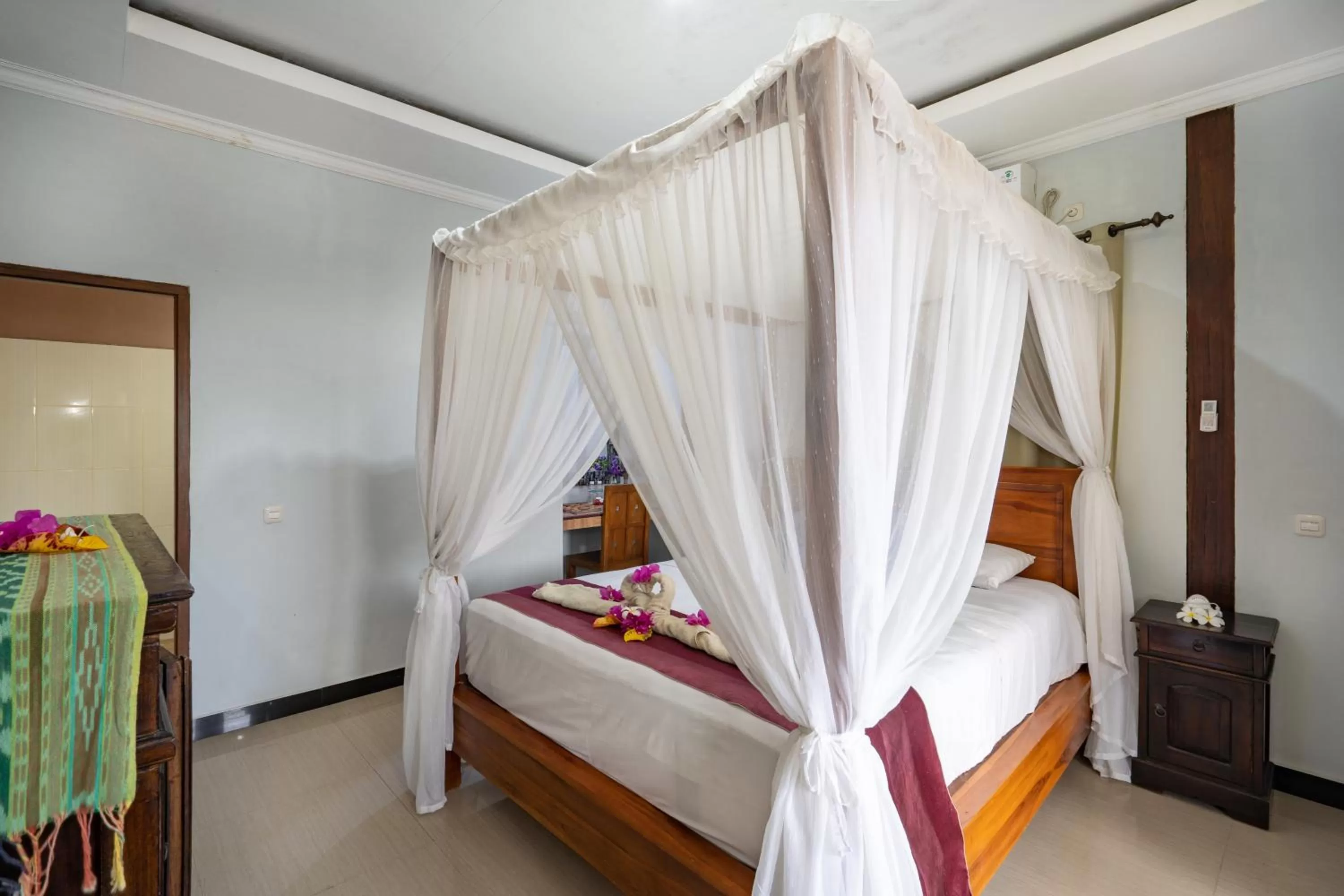 Bed in Mushroom Beach Bungalows