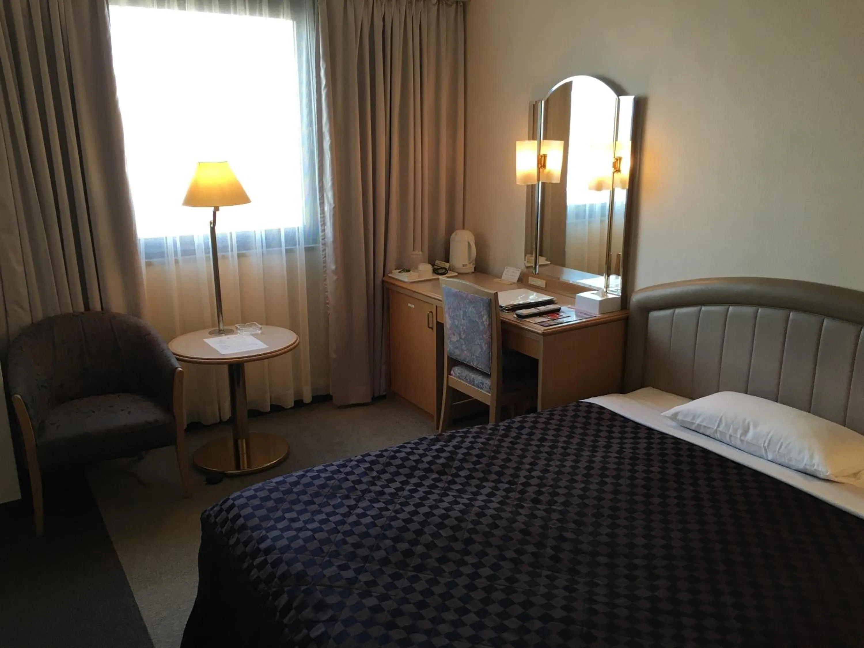 Bed in Urayasu Beaufort Hotel