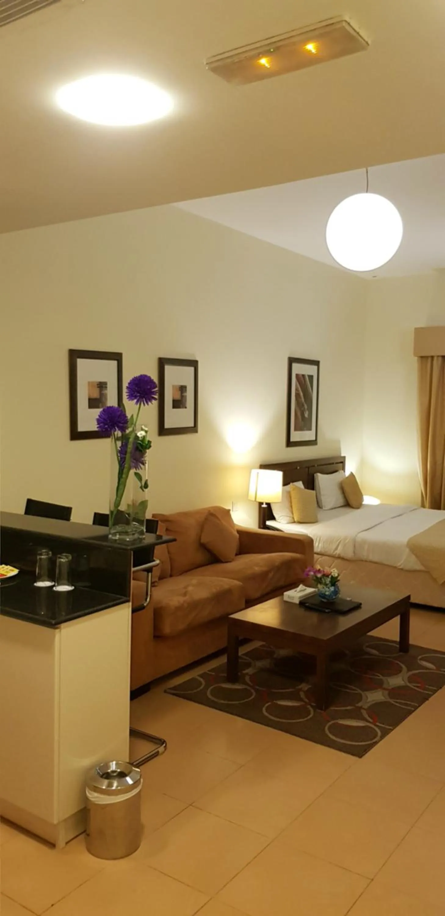 Living room, Bed in Tulip Hotel Apartments