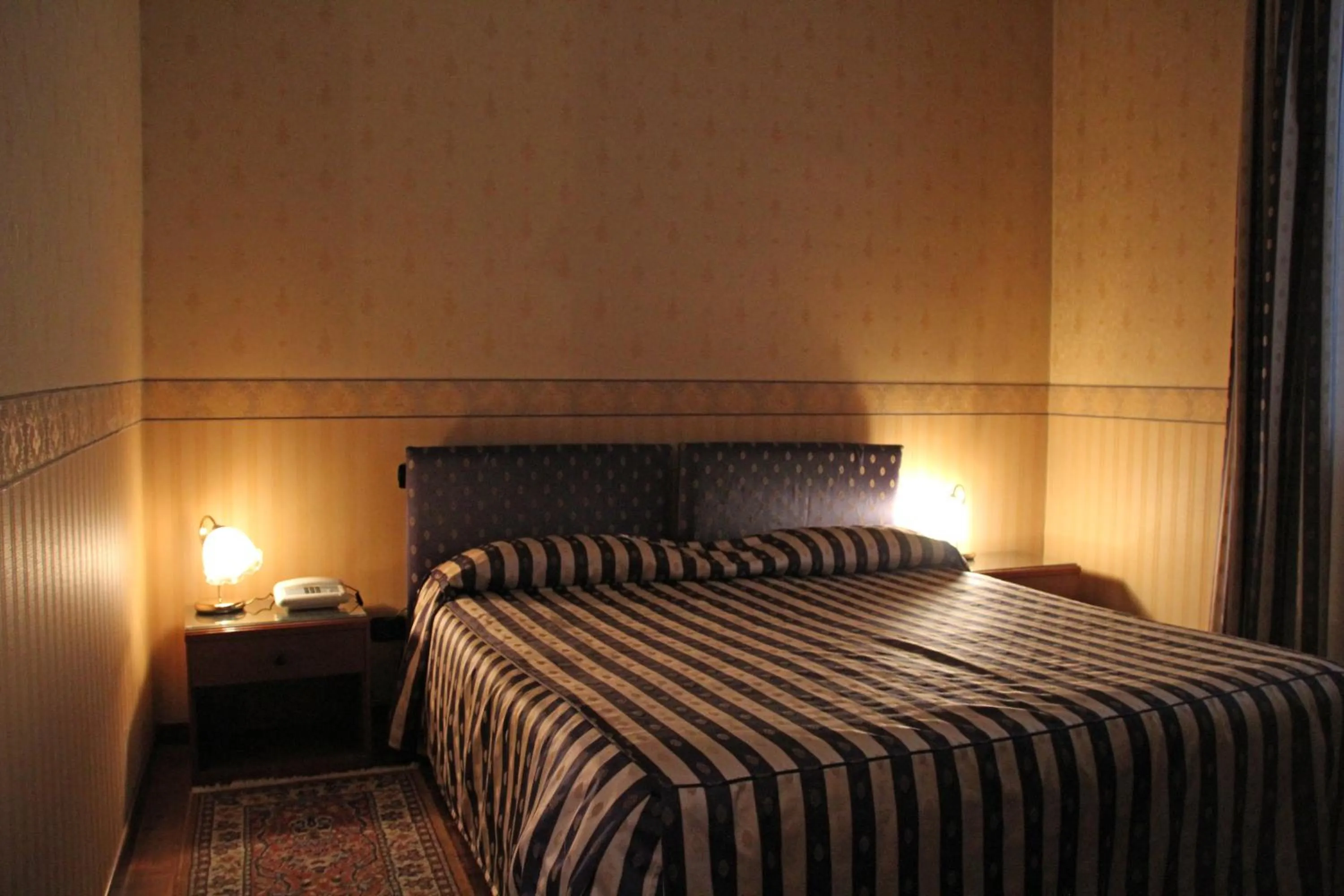 Bedroom, Bed in Albergo Ristorante Leon d'Oro