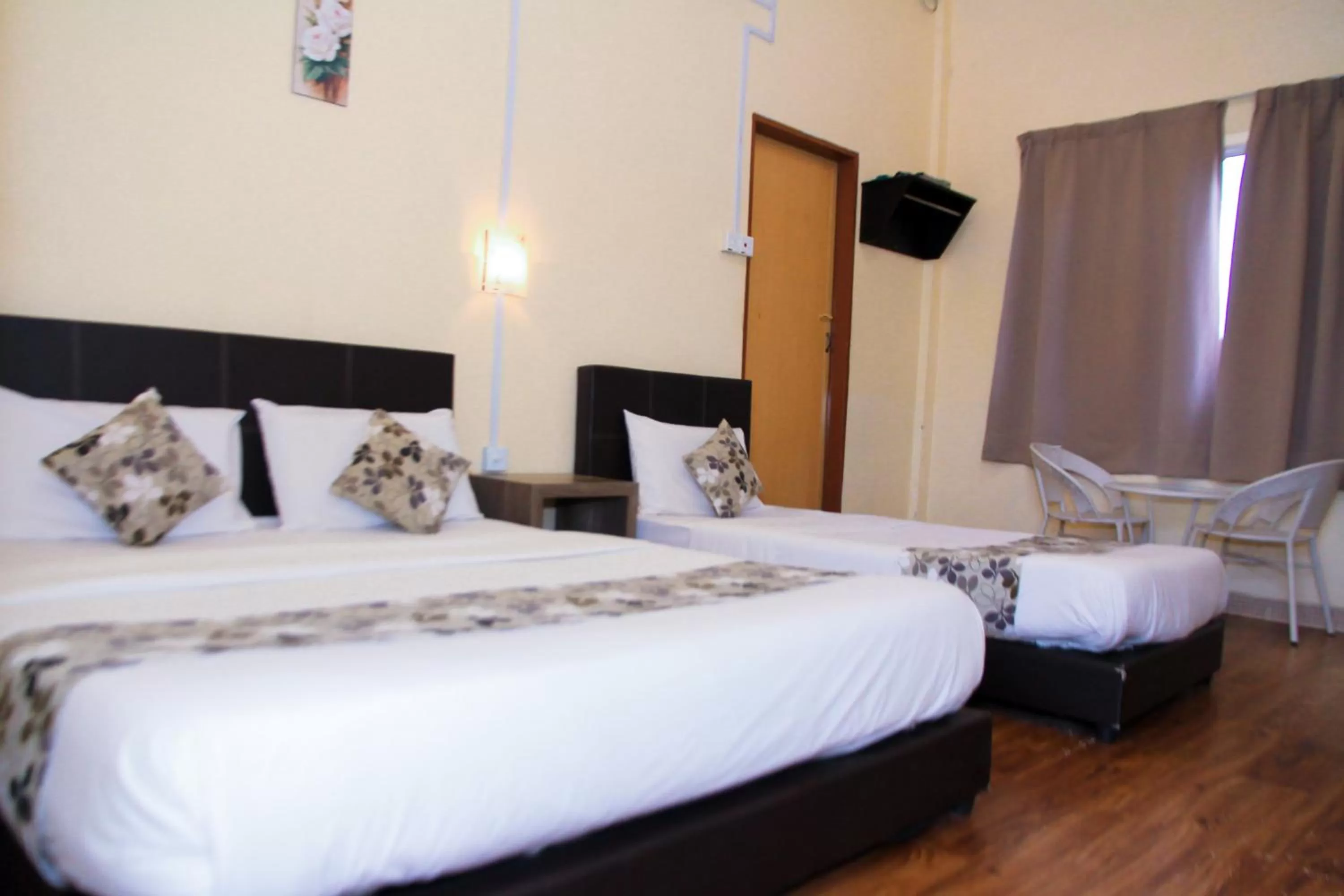 Bed in Myra Hotel Mersing