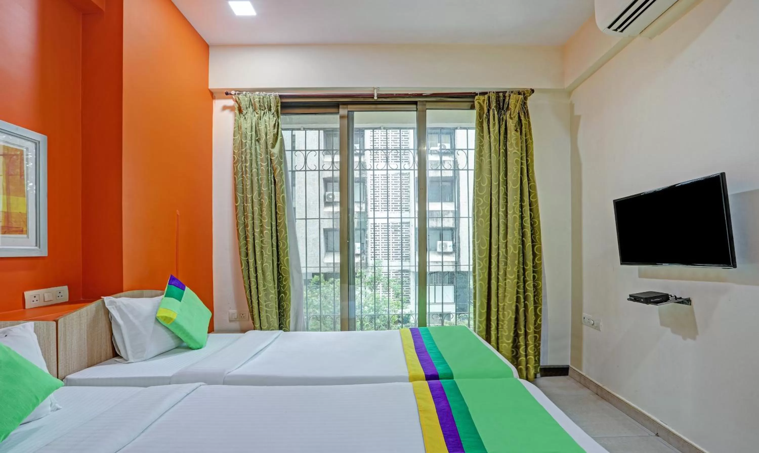 Bed in Treebo Trend Welcome Apartments