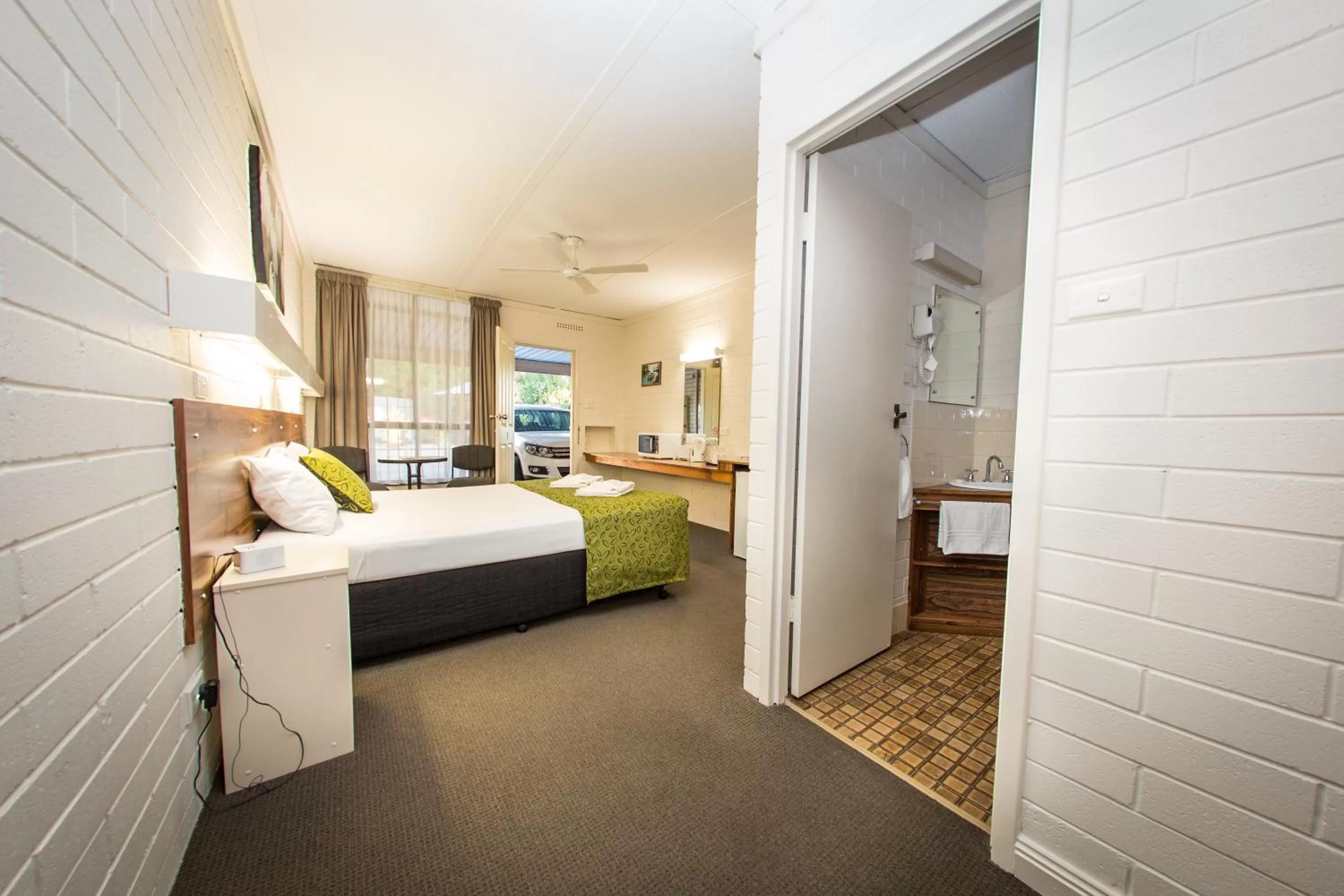 Bed in 7th Street Motel