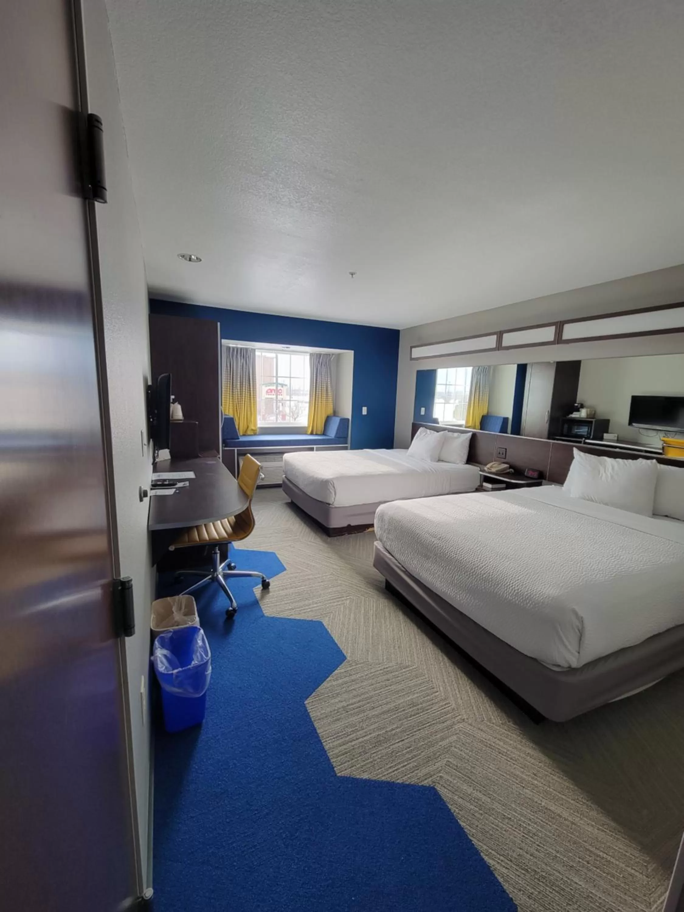 Bed in Microtel Inn & Suites by Wyndham Bluffs