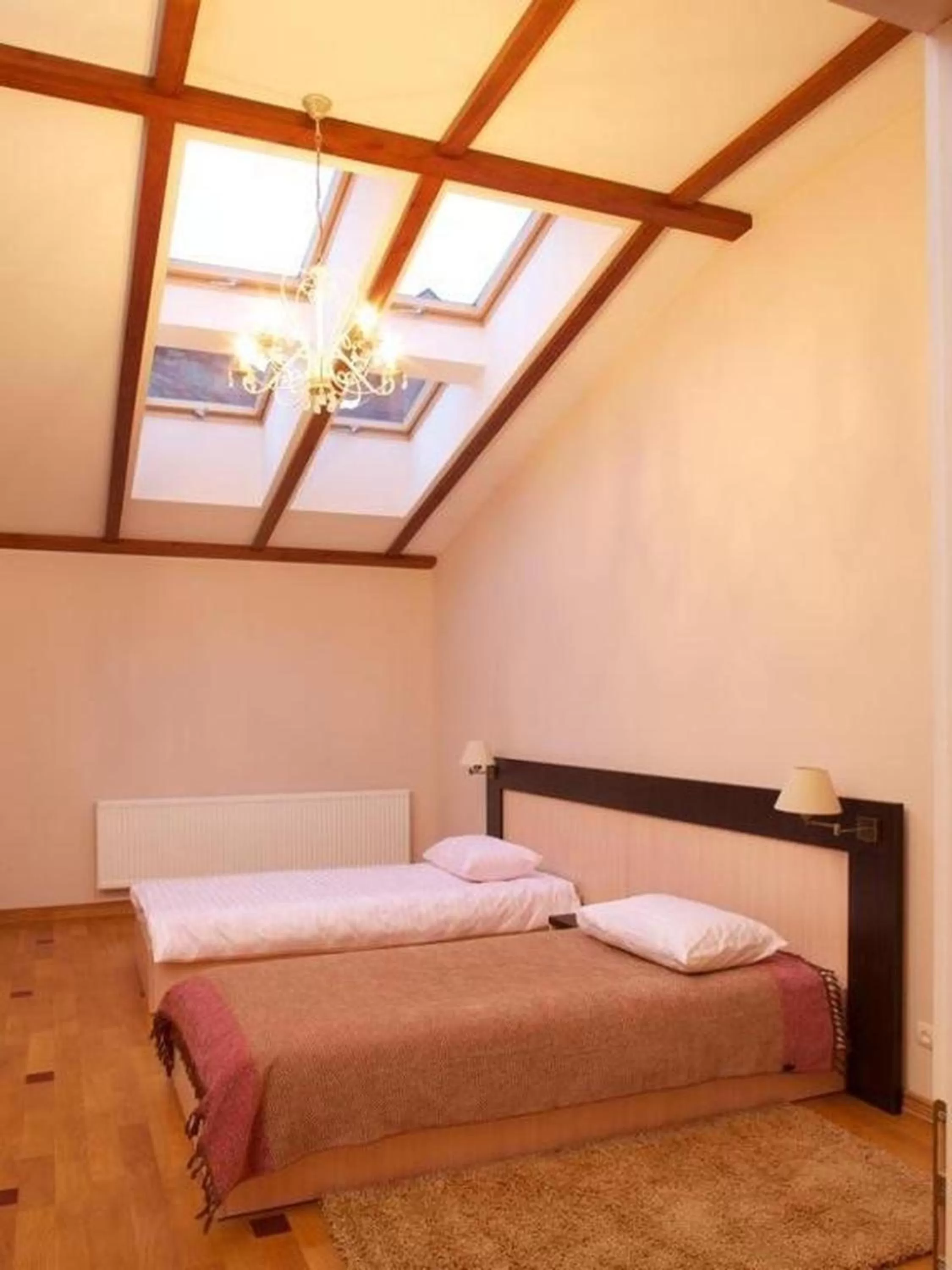 Bed in Mini-Hotel Under The Roof