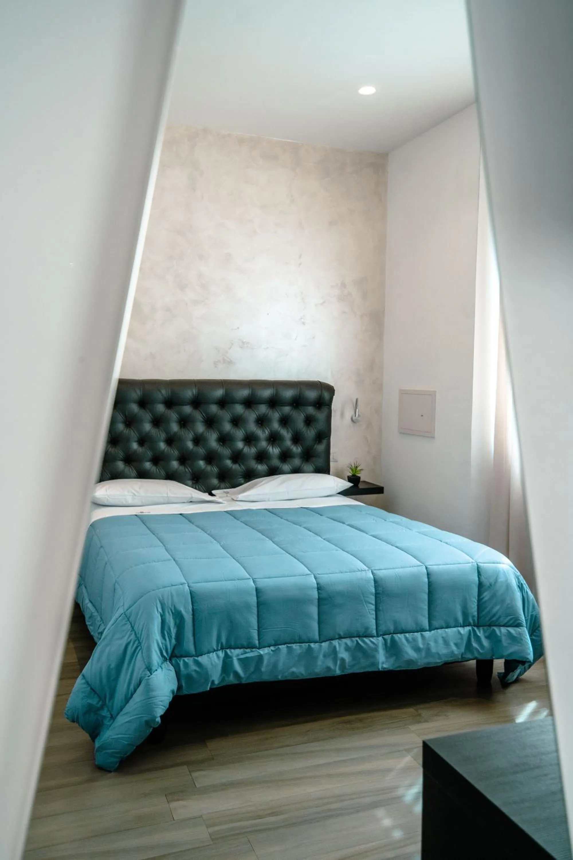 Decorative detail, Bed in Hotel Bruman Salerno