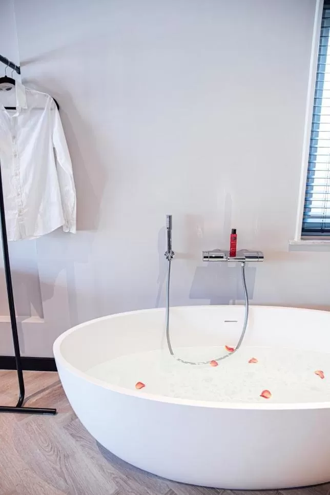 Bath in Harbour Suites Boutique Hotel