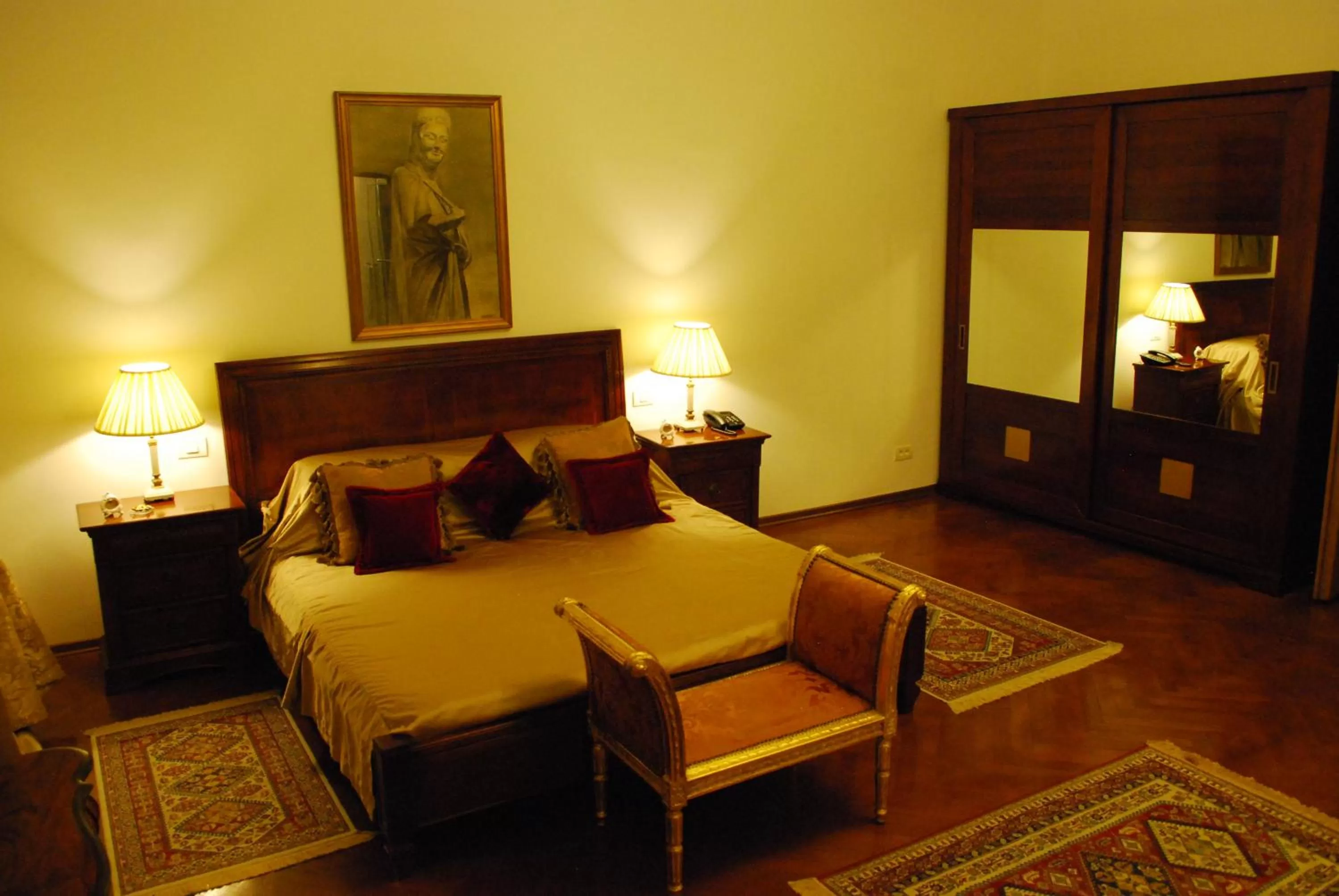 Bed in Grand Boutique Hotel