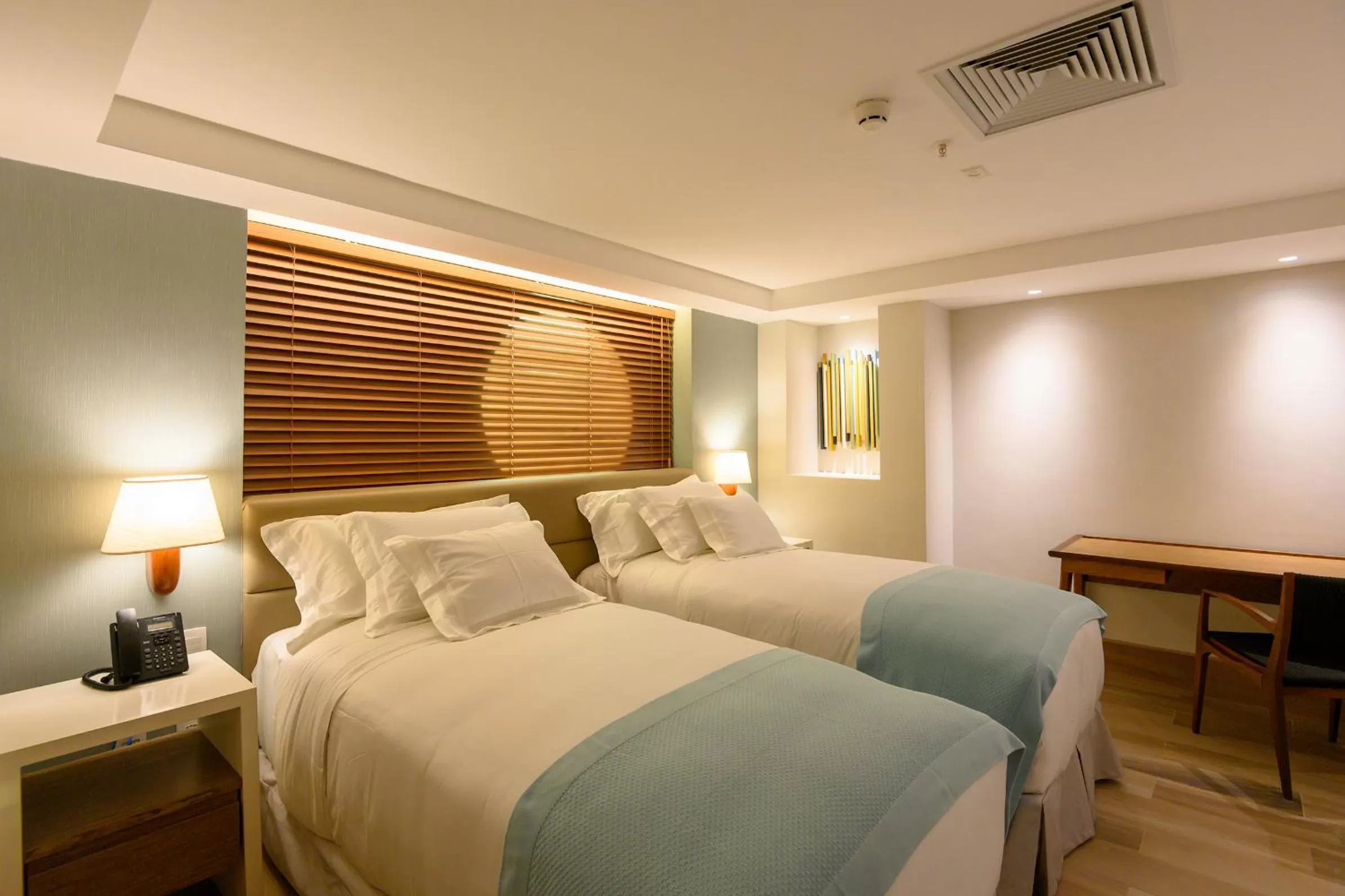 Bed in Vogal Luxury Beach Hotel & SPA