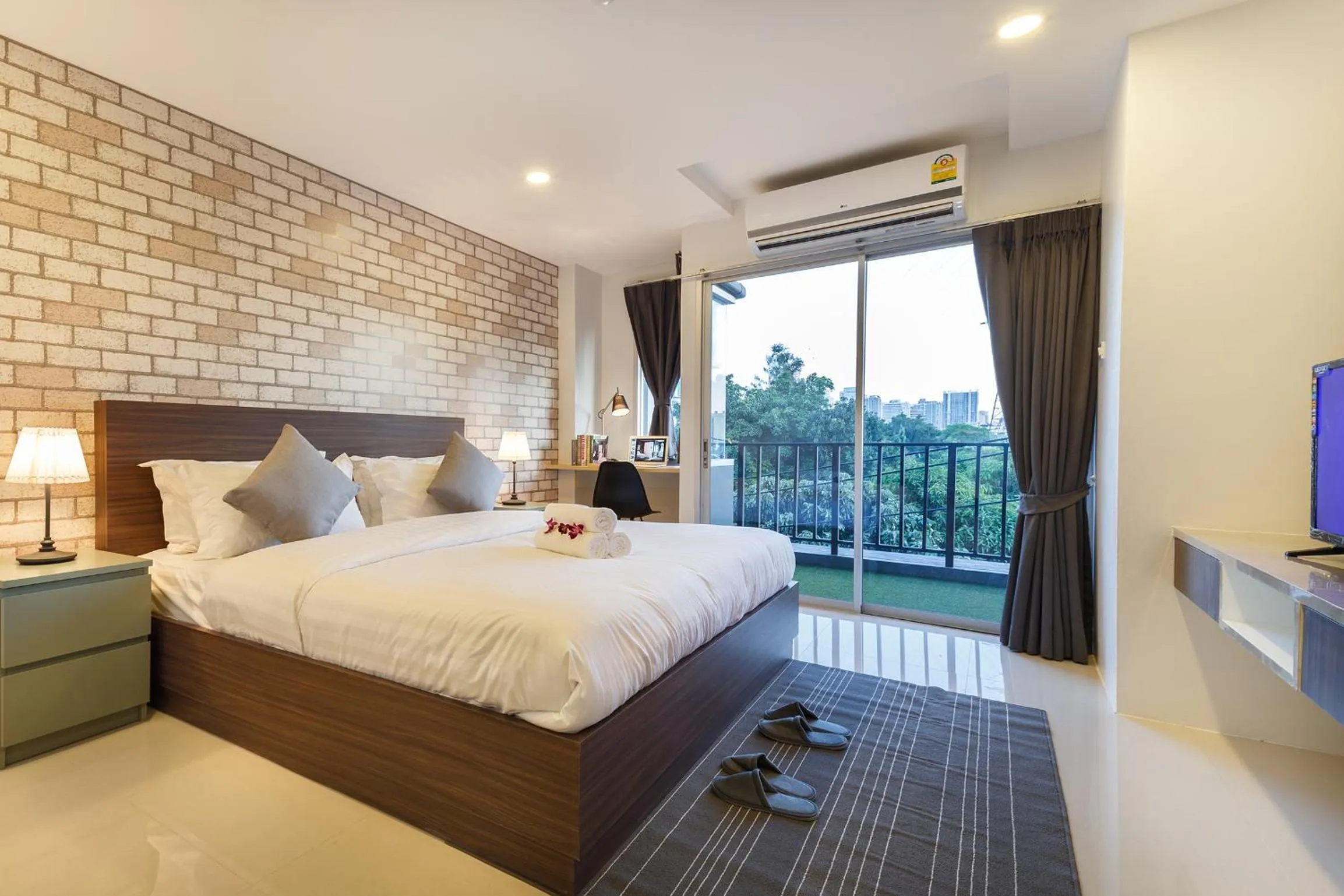 Bed in Q Space Residence