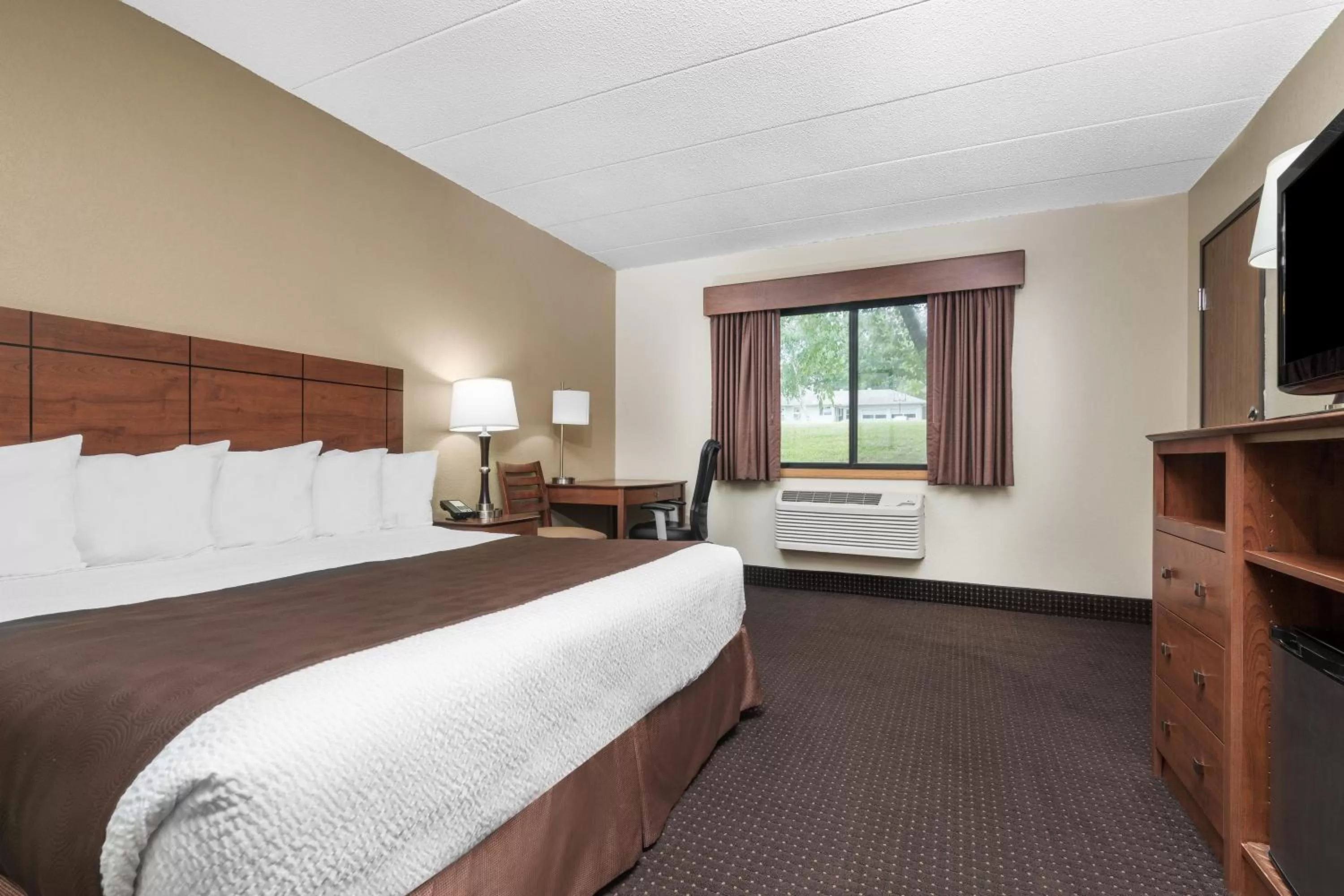 Photo of the whole room, Bed in AmericInn by Wyndham Lake City