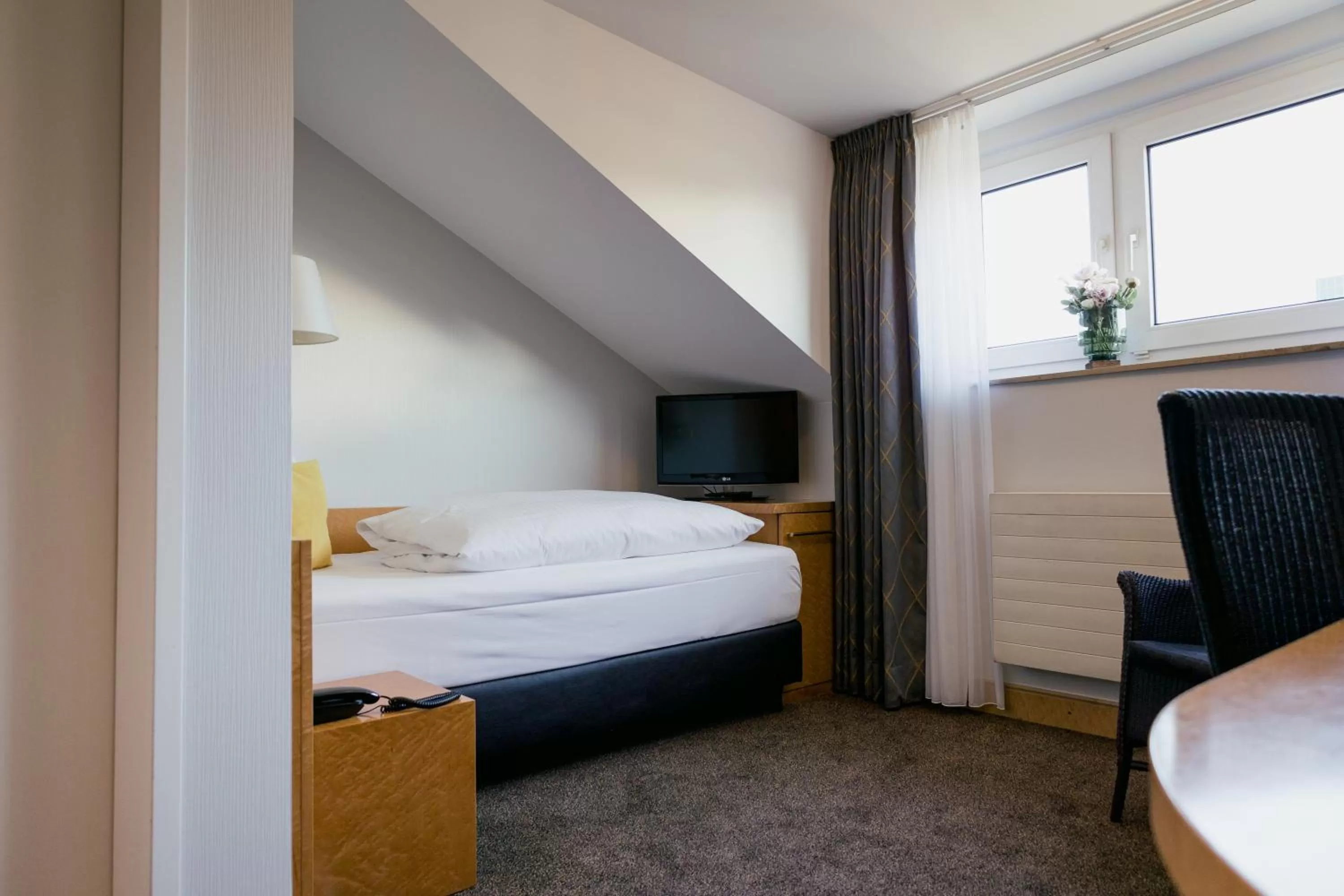 Bed in DOM Hotel LIMBURG