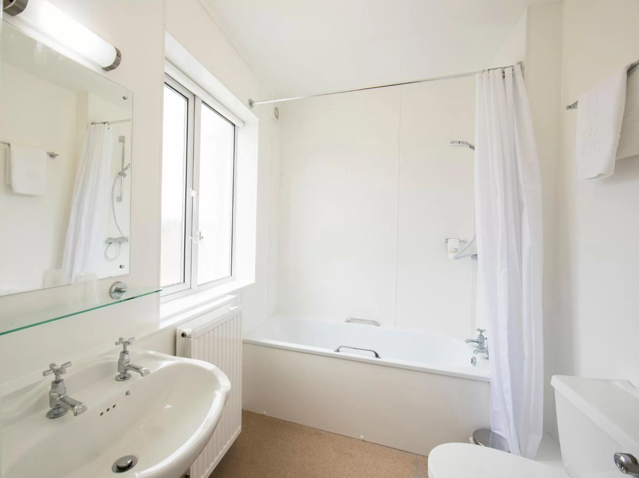 Bathroom in Half Moon, Sherborne by Marston's Inns