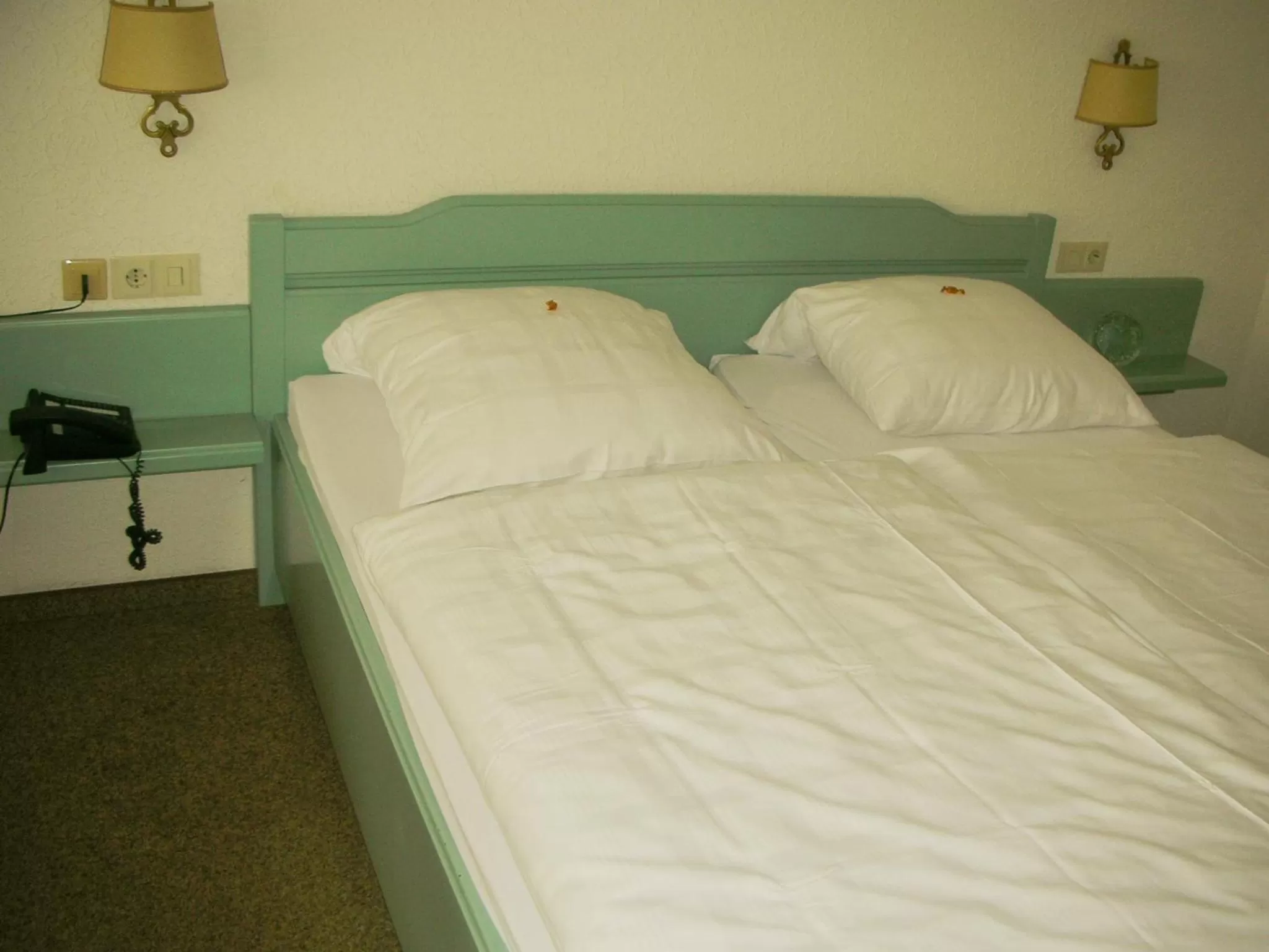 Bed in Heidehotel Hildfeld