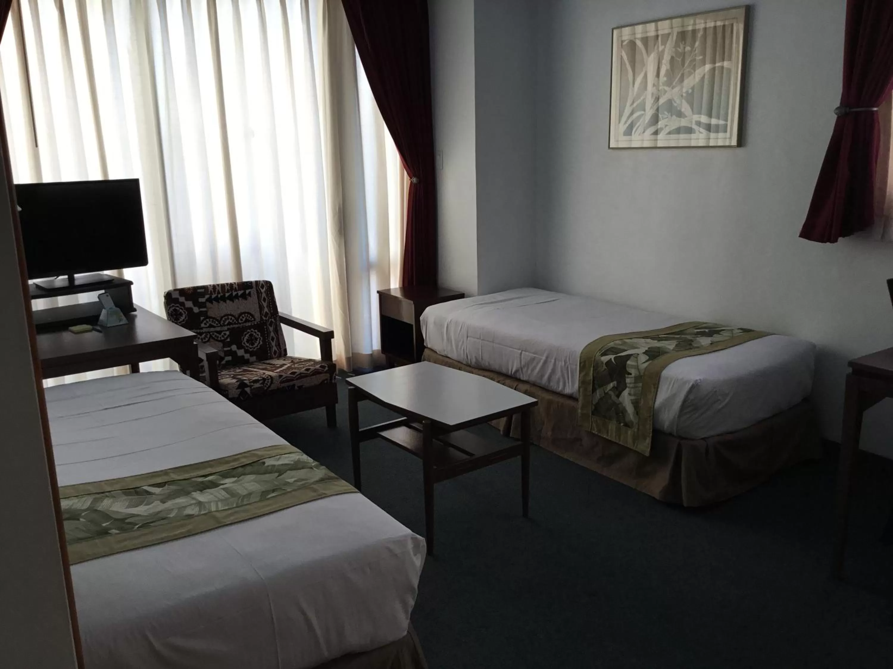 Bed in Holiday Surf Hotel (with full kitchen)