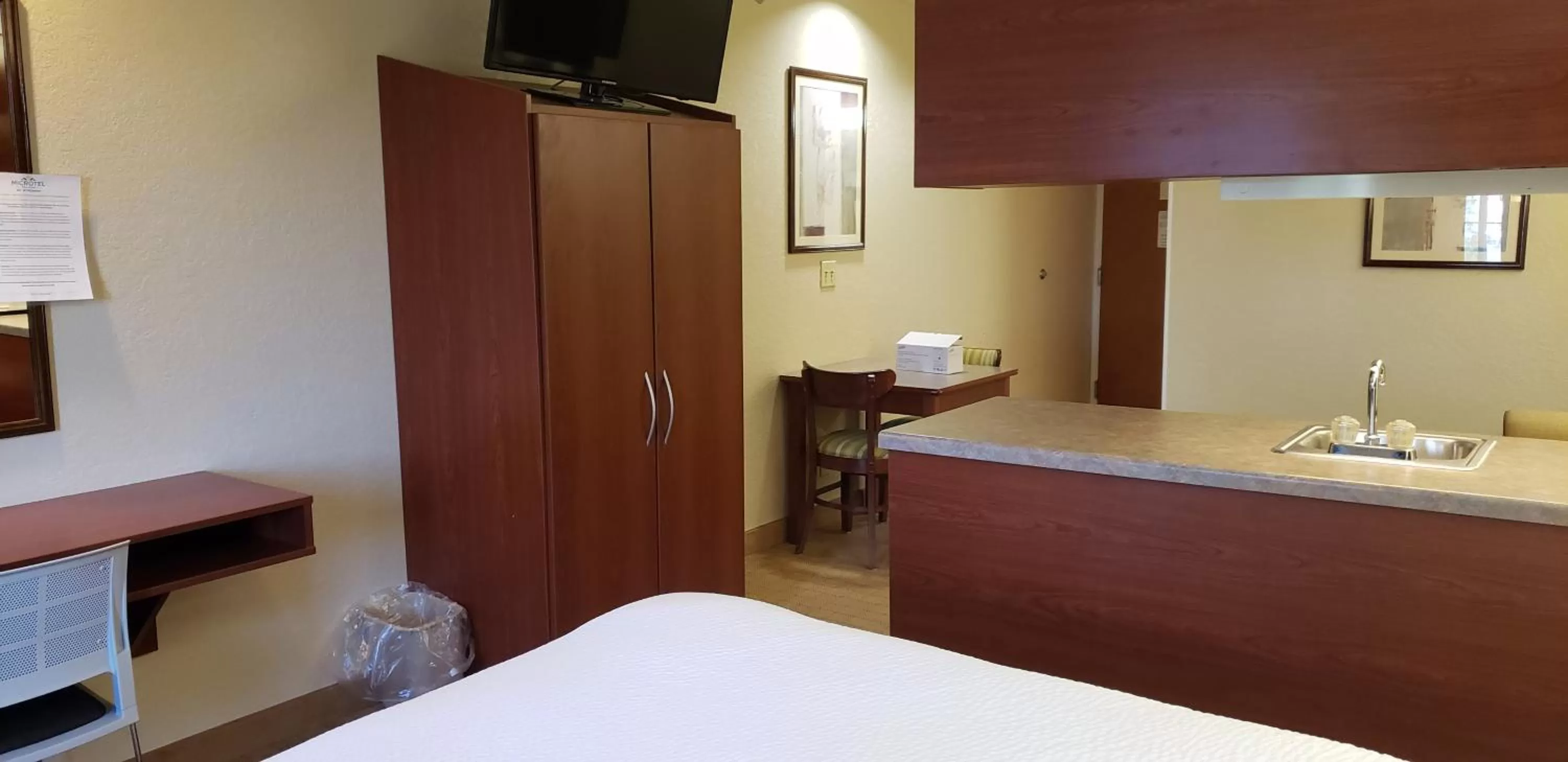 Bed in Microtel Inn & Suites by Wyndham Wellsville
