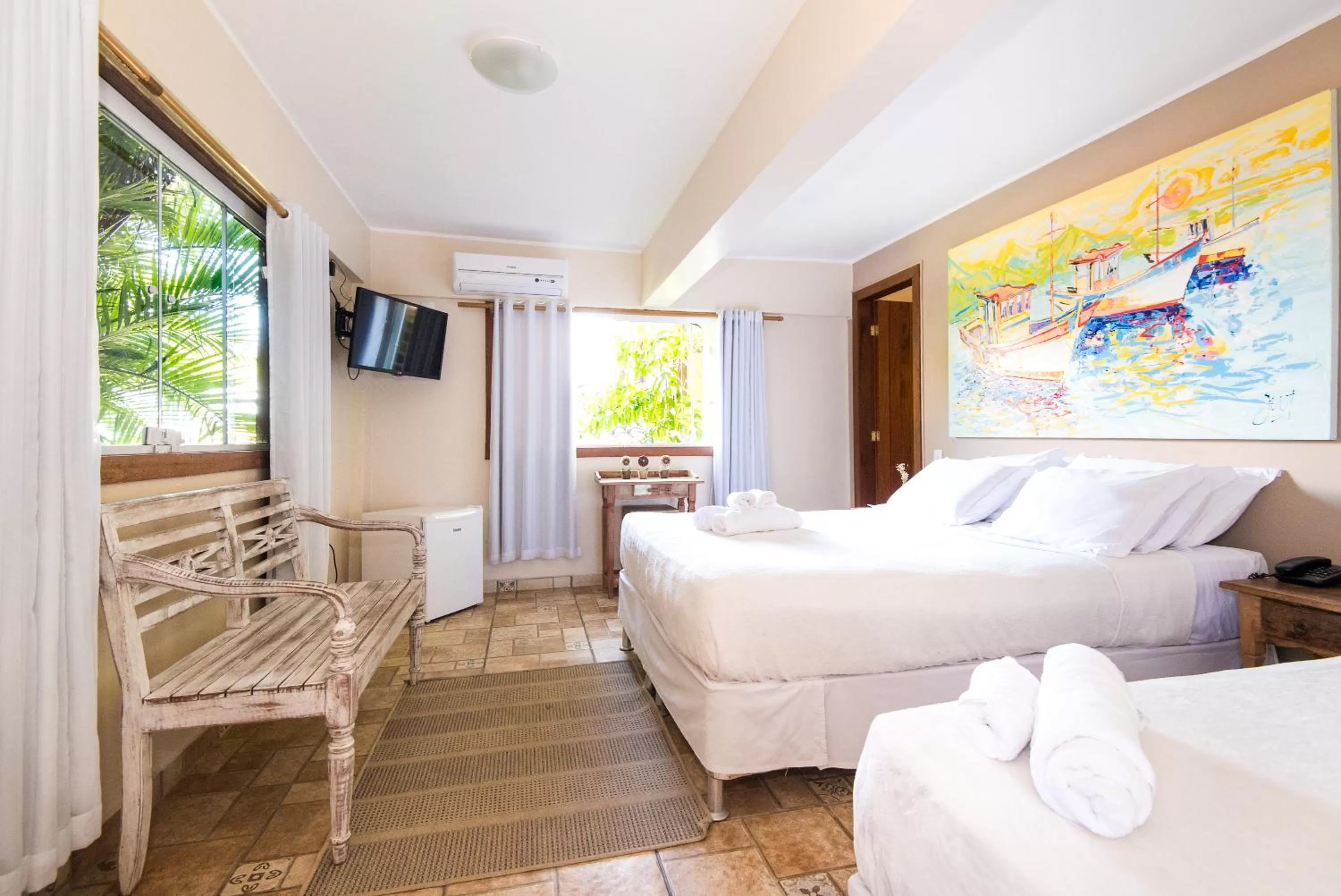 Bed in Pousada La Dolce Vita