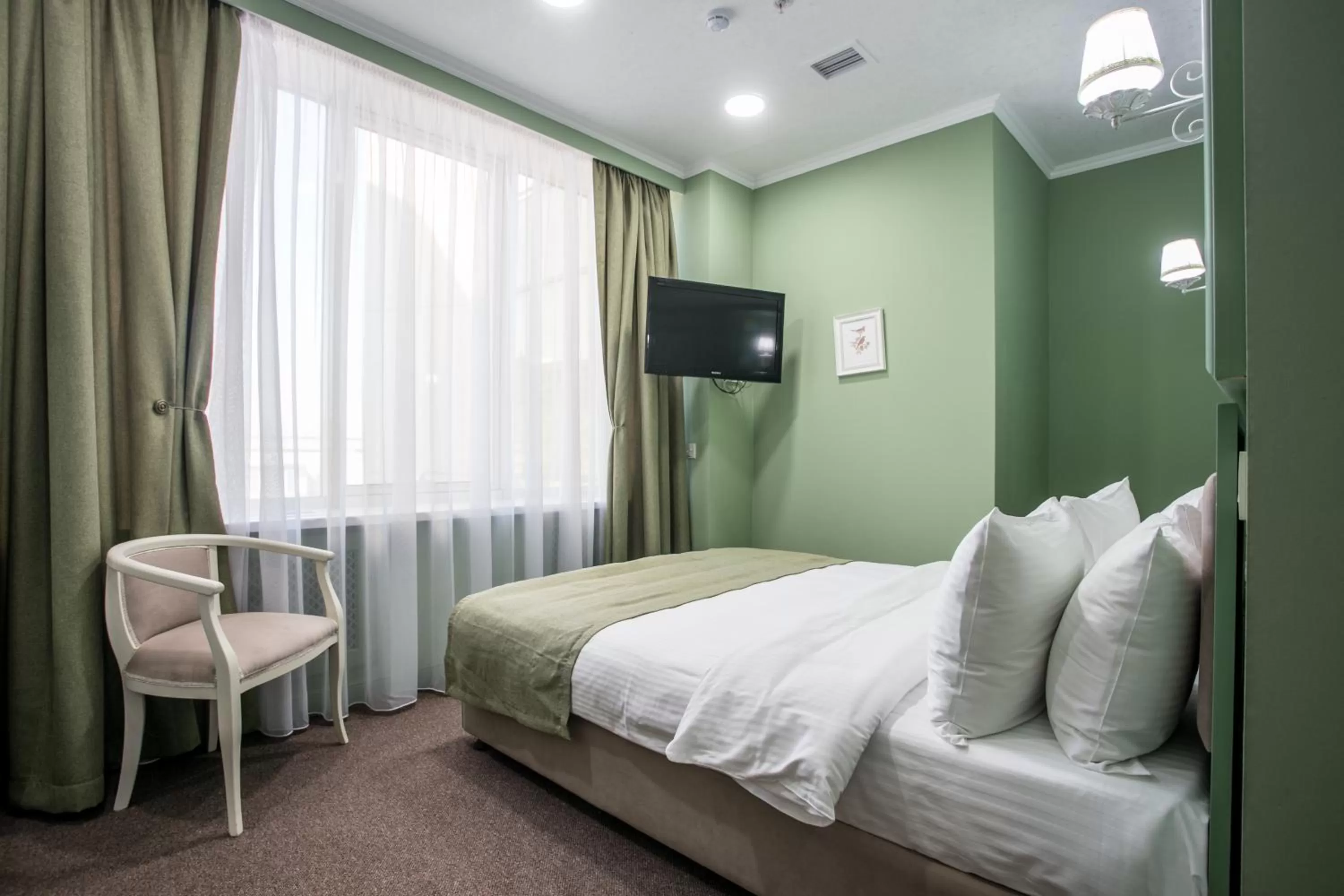 Bed in Grand Sapphire Hotel