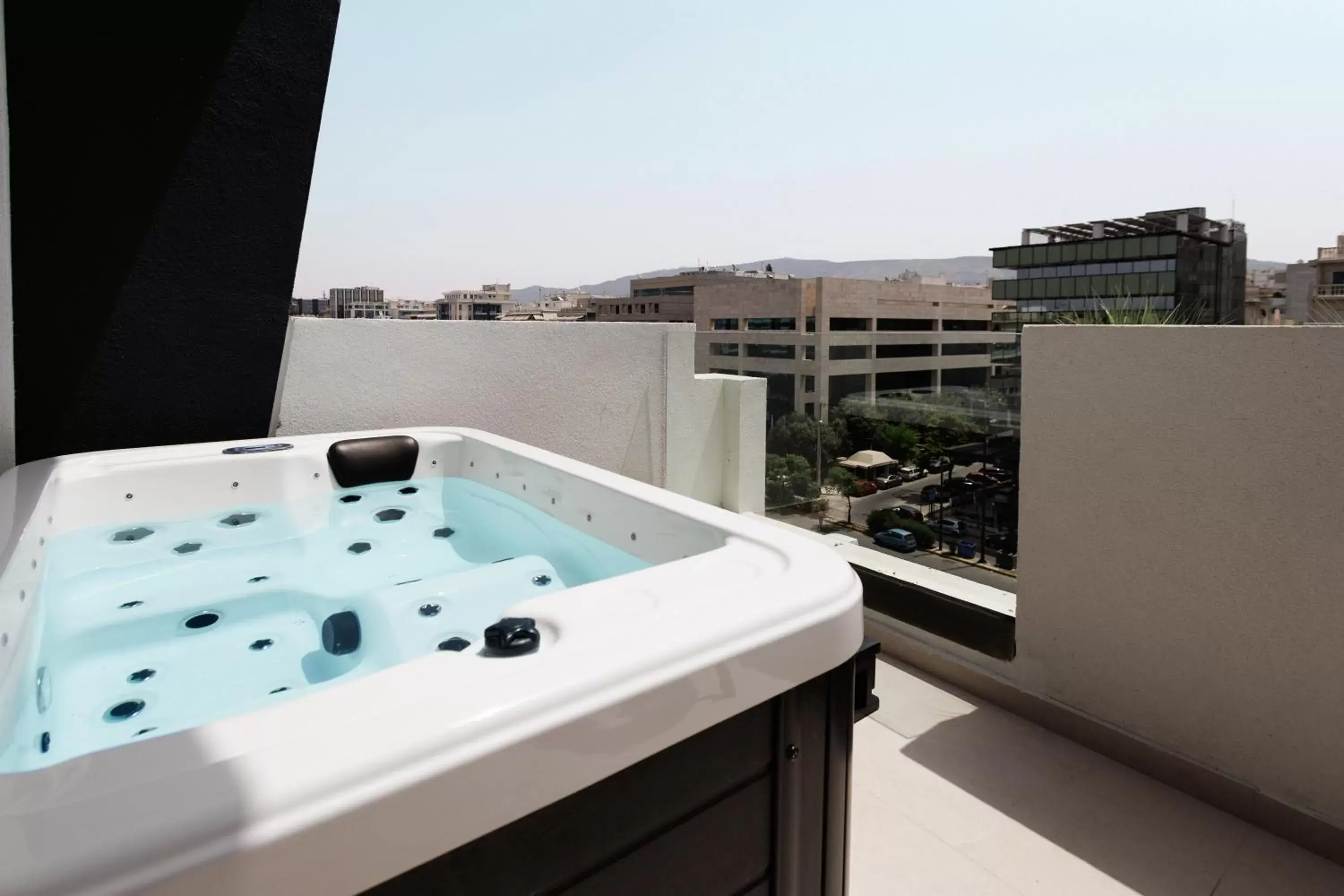 Junior Suite with Outdoor Jacuzzi in LUX&EASY Signature Syngrou 234 Junior Suite with Outdoor Jacuzzi in LUX&EASY Signature Syngrou 234