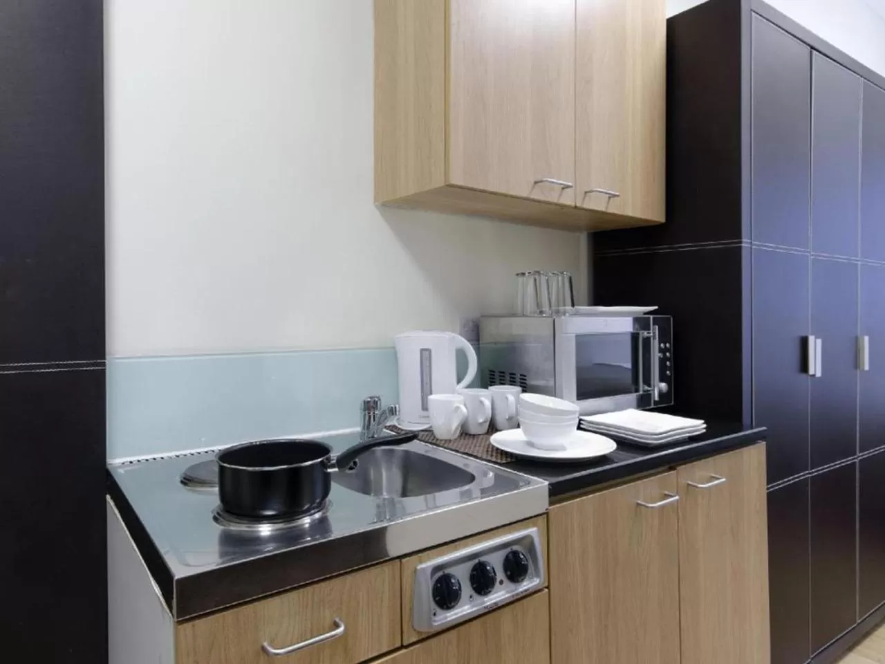 Kitchen or kitchenette in The Royale Chulan Hyde Park Hotel