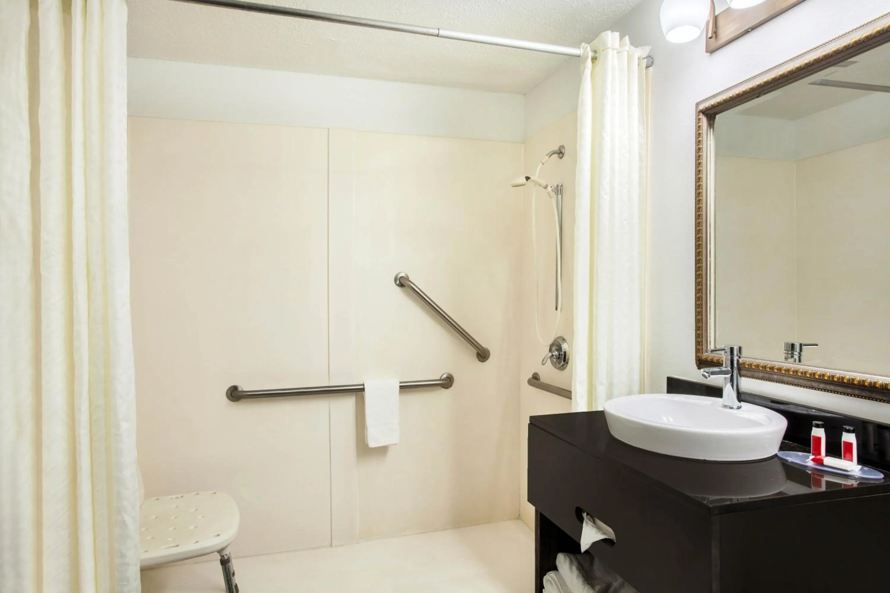 Bathroom in Super 8 by Wyndham Pensacola