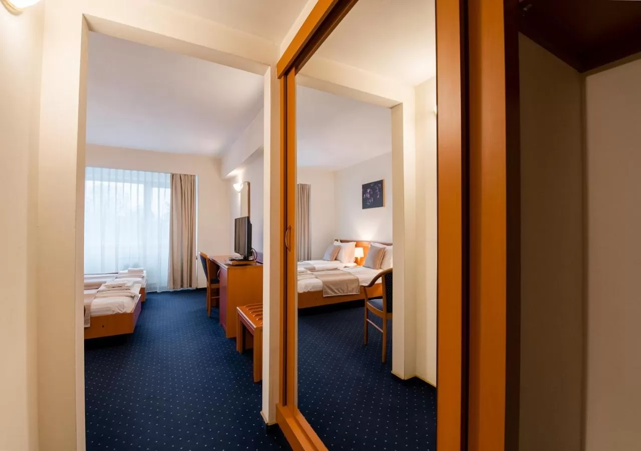 Bed in Hotel Excelsior By TimHotels