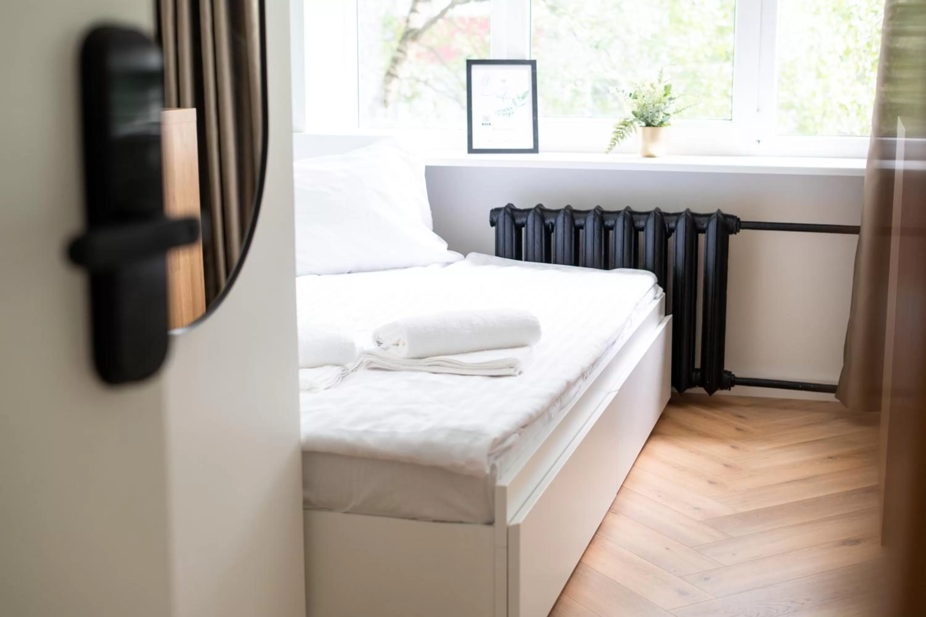 Bed in Oasis Airport Studios by RevalHome