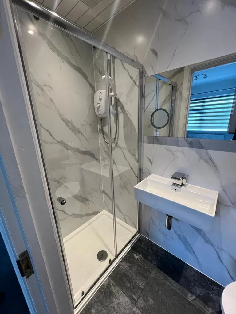 Shower in Charnwood Regency Guest House