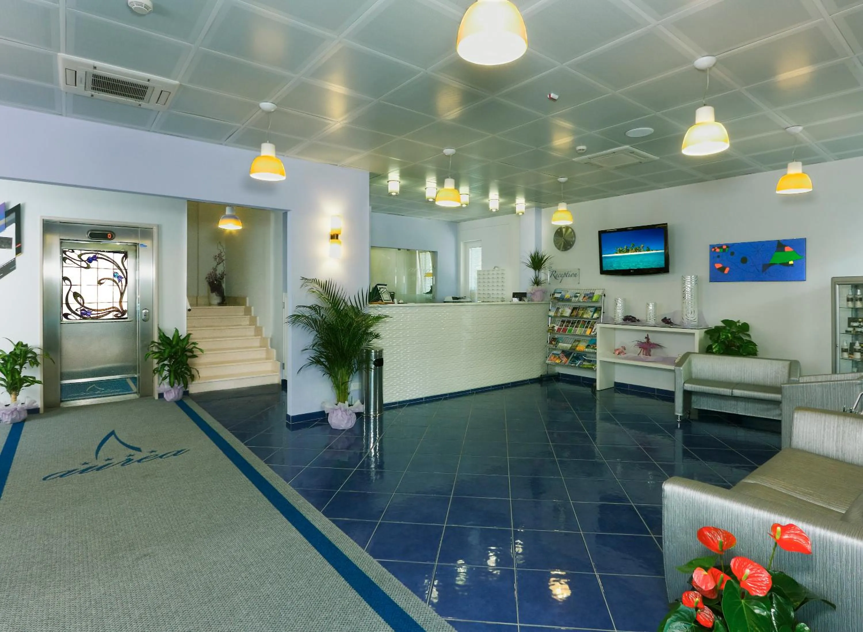 Lobby or reception in Aurea Hotel