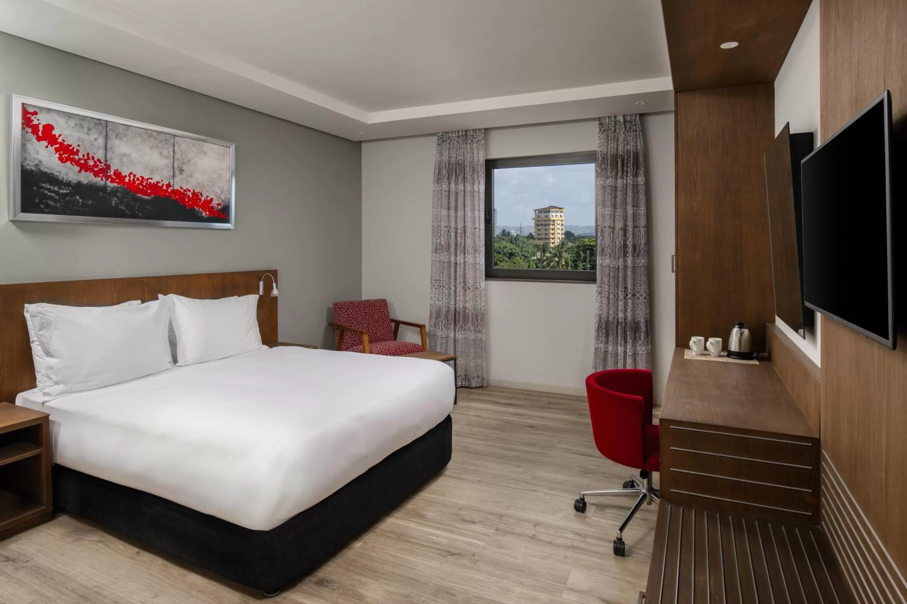 Photo of the whole room, Bed in Crowne Plaza - Dar Es Salaam by IHG