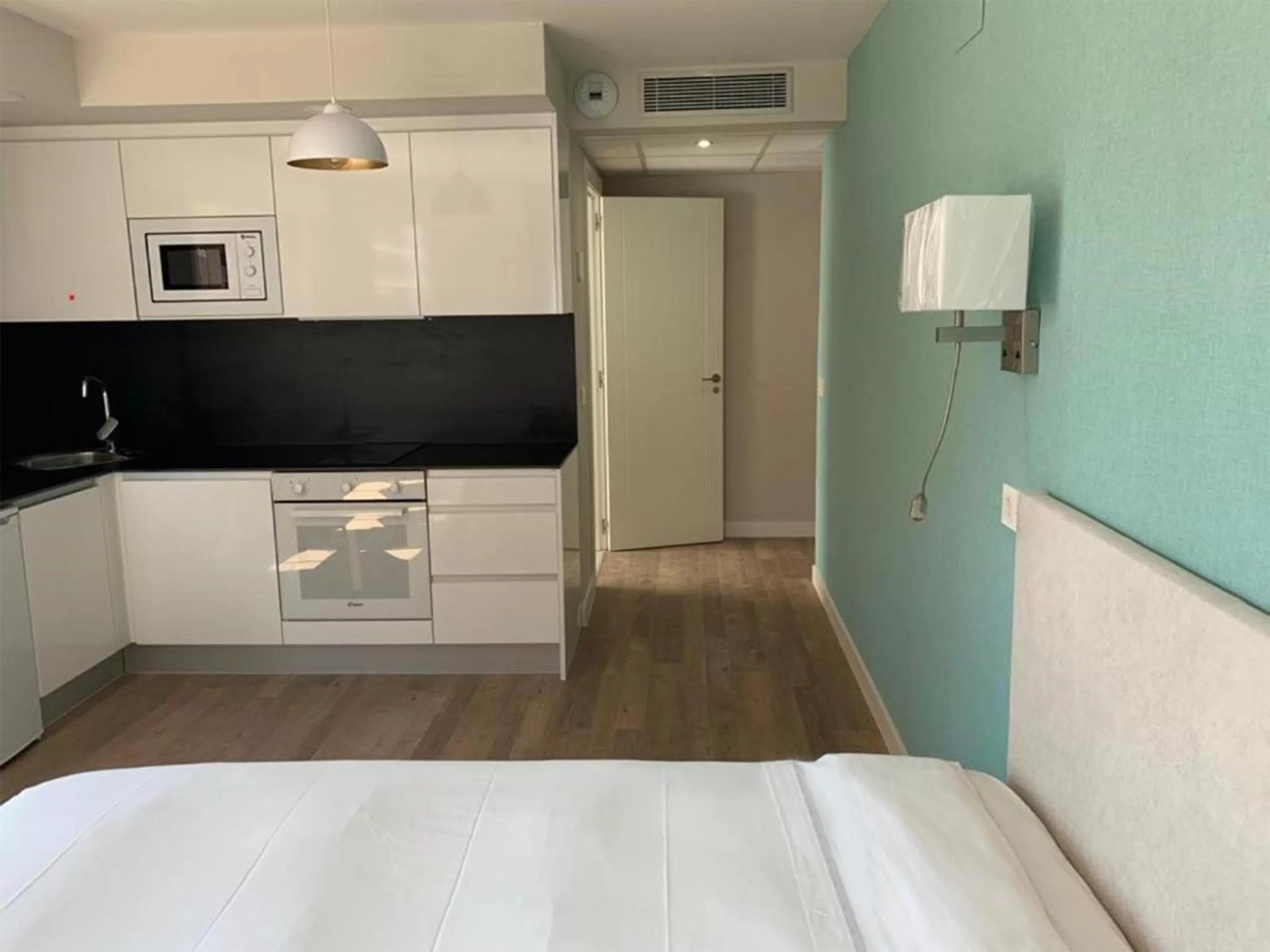 Kitchen or kitchenette in Aparthotel Essenzia de Castilla