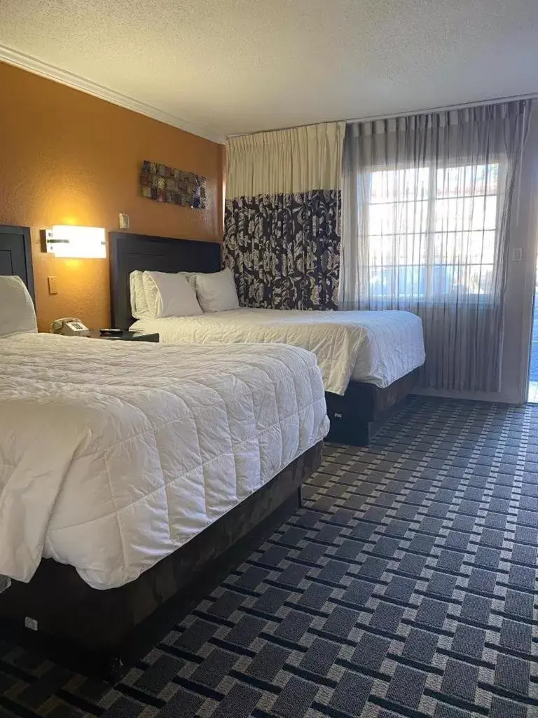 Queen Room with Two Queen Beds - Non-Smoking in Budget INN At The Heavenly Gondola Queen Room with Two Queen Beds - Non-Smoking in Budget INN At The Heavenly Gondola