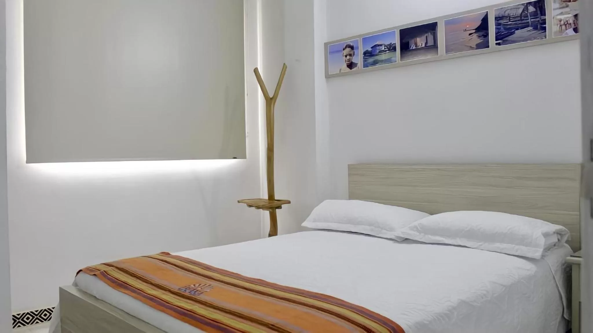 Bed in Hotel Iraka Zenu