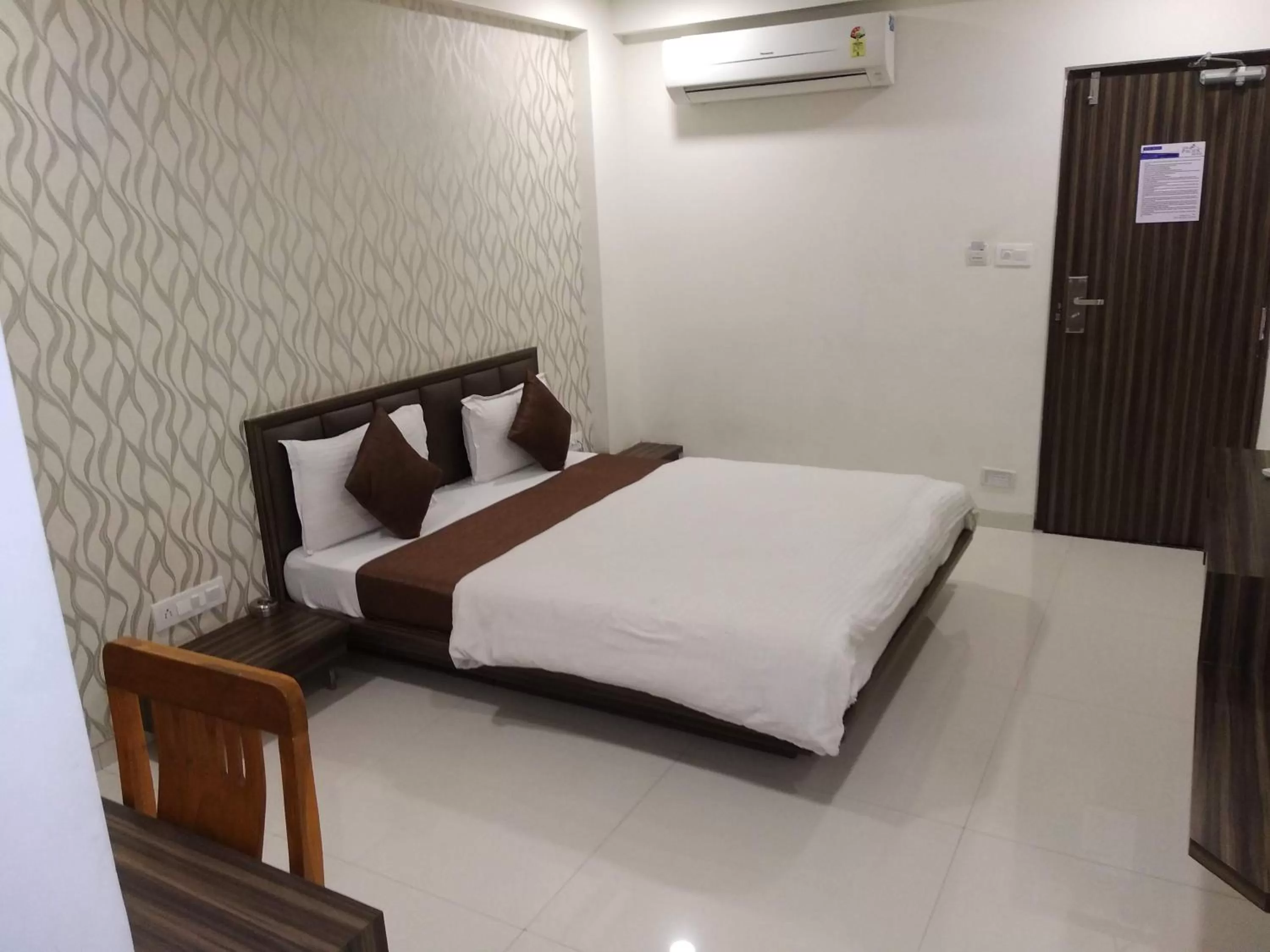 Bed in The Pacific Hotel