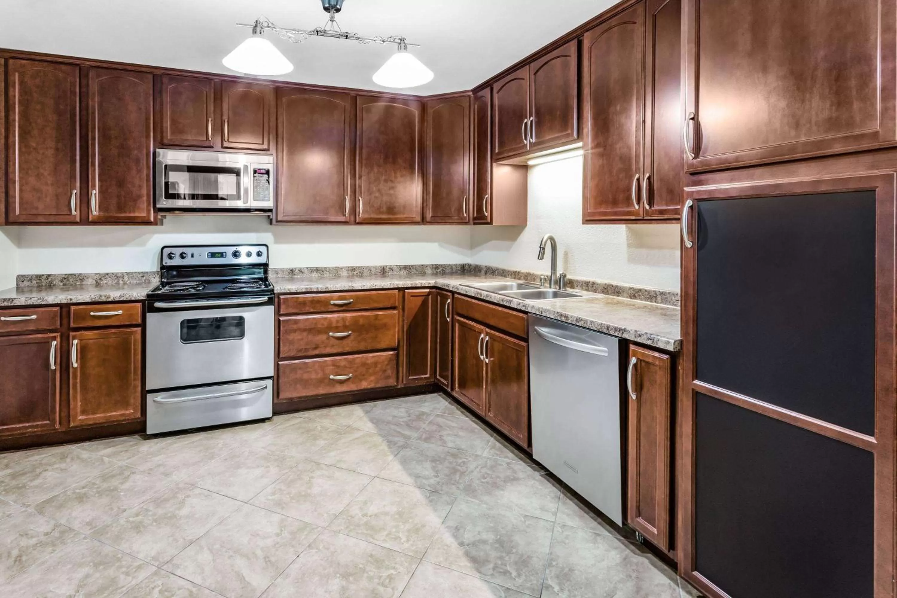 Kitchen or kitchenette in AmericInn & Suites Burnsville, MN