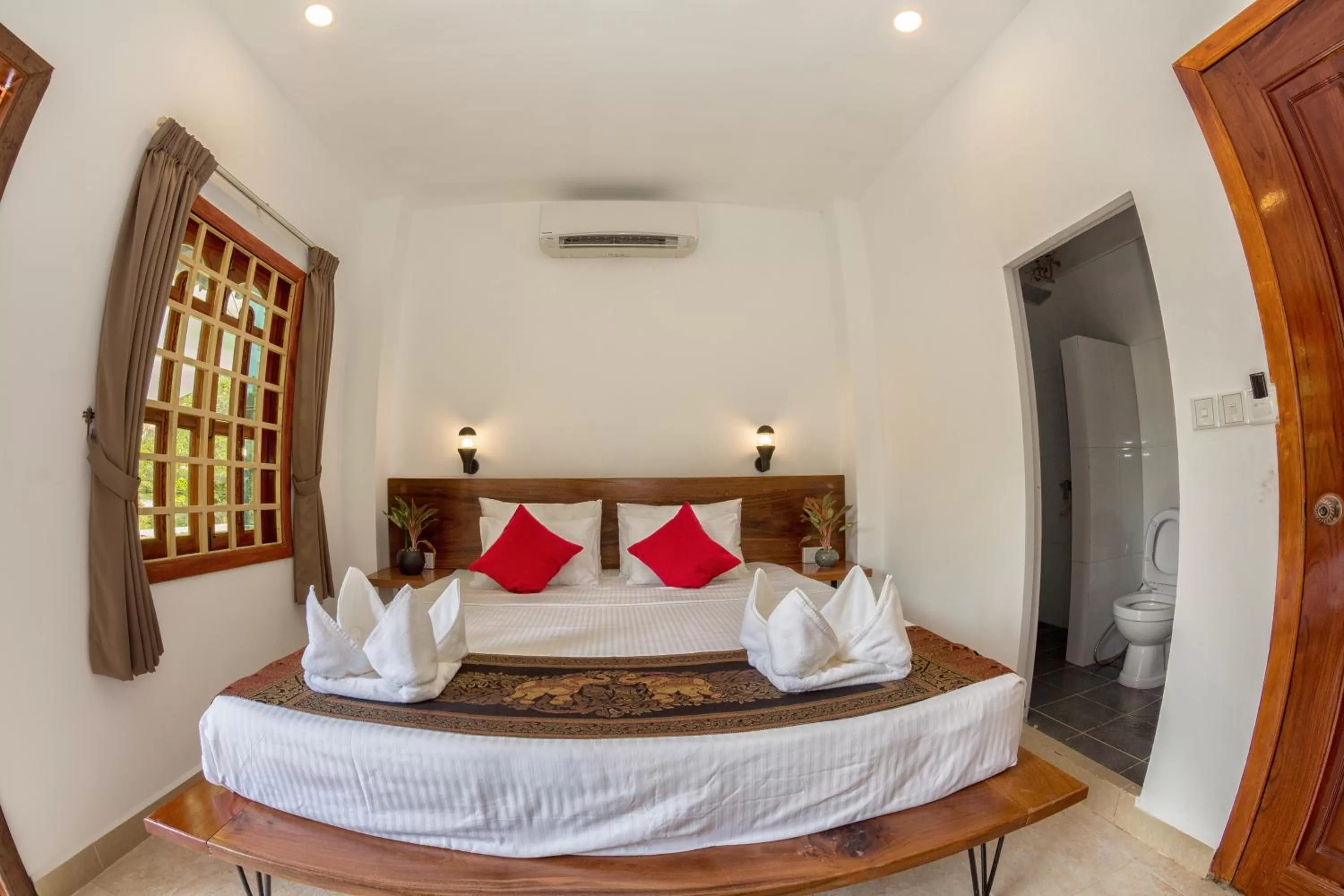 Bed in Poolside Villa