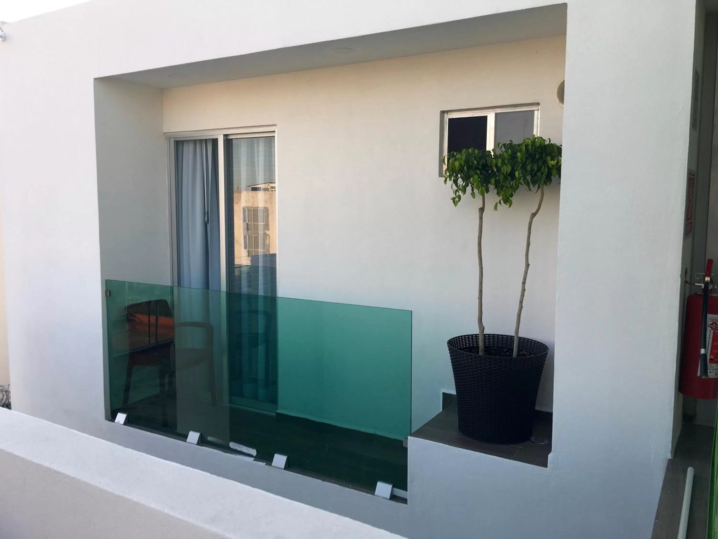 Balcony/Terrace in Herbal Inn Suites