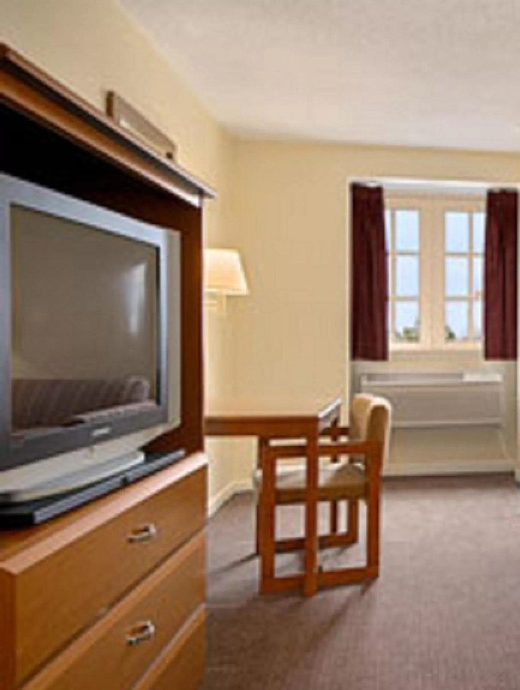 TV and multimedia, Bed in Super 8 by Wyndham New Orleans