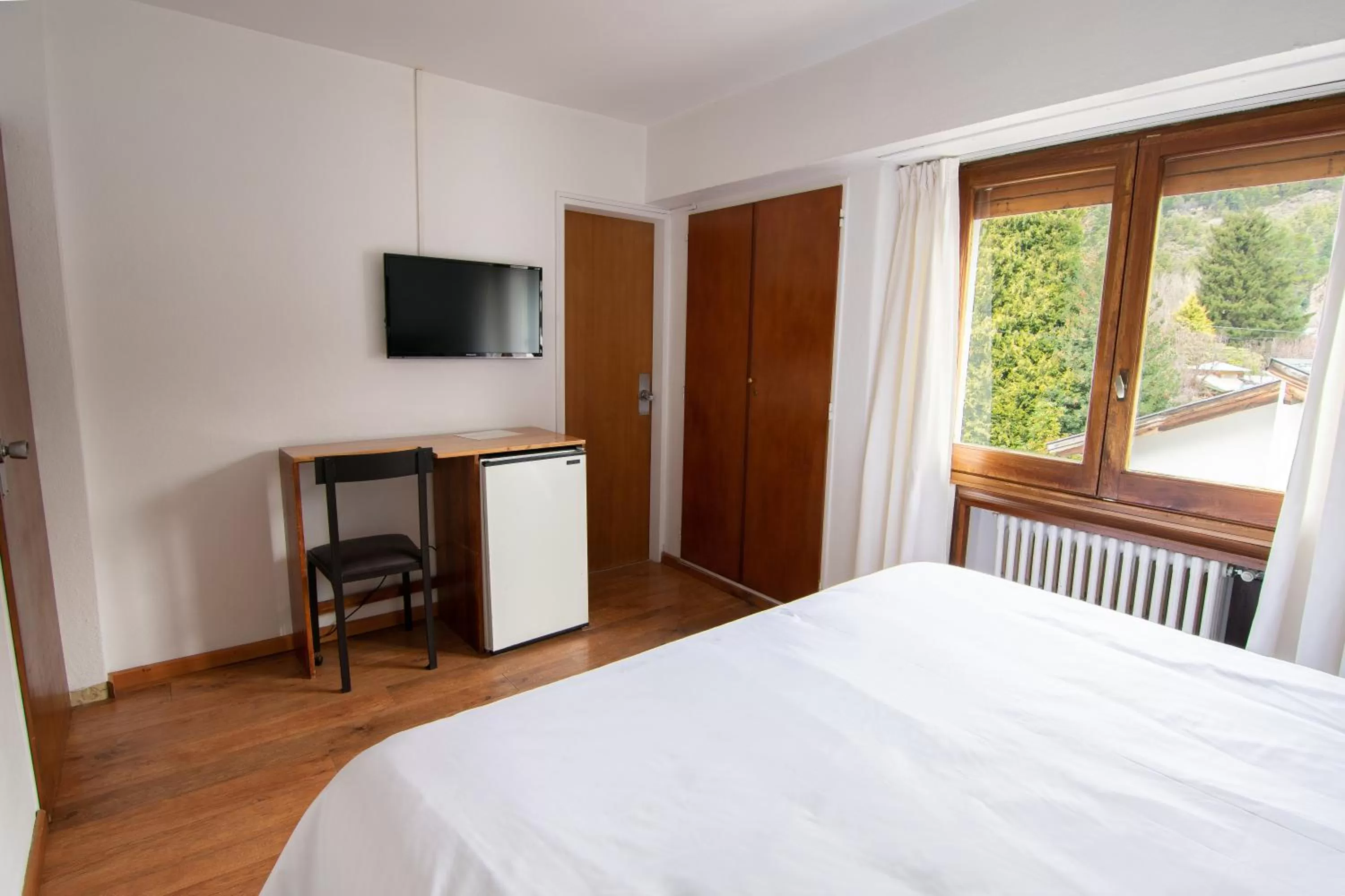 Bed in Hosteria Hostal del Esquiador