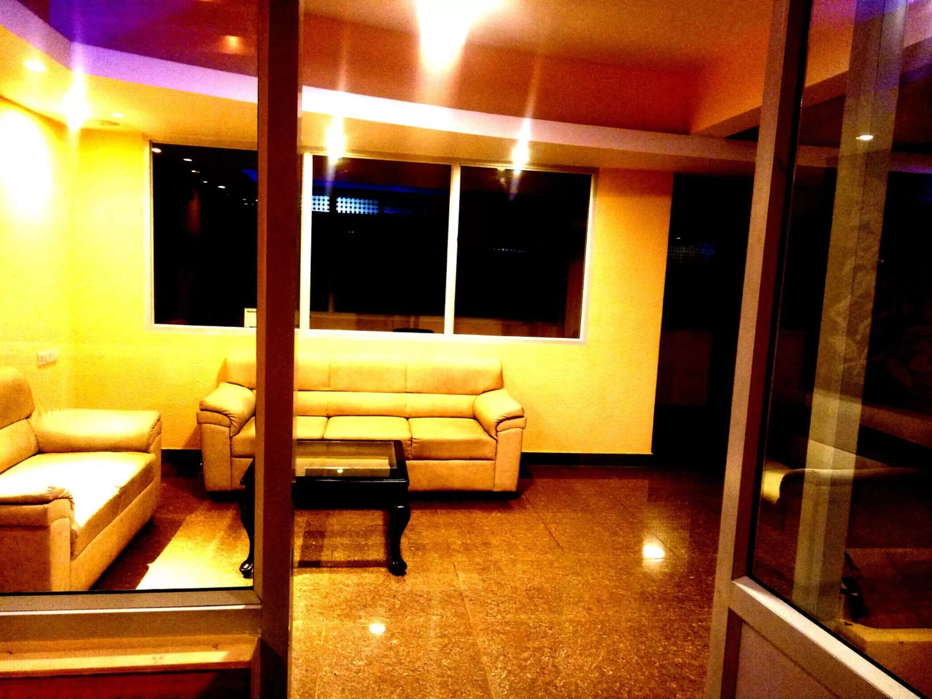 Seating area in Arra Suites kempegowda Airport Hotel